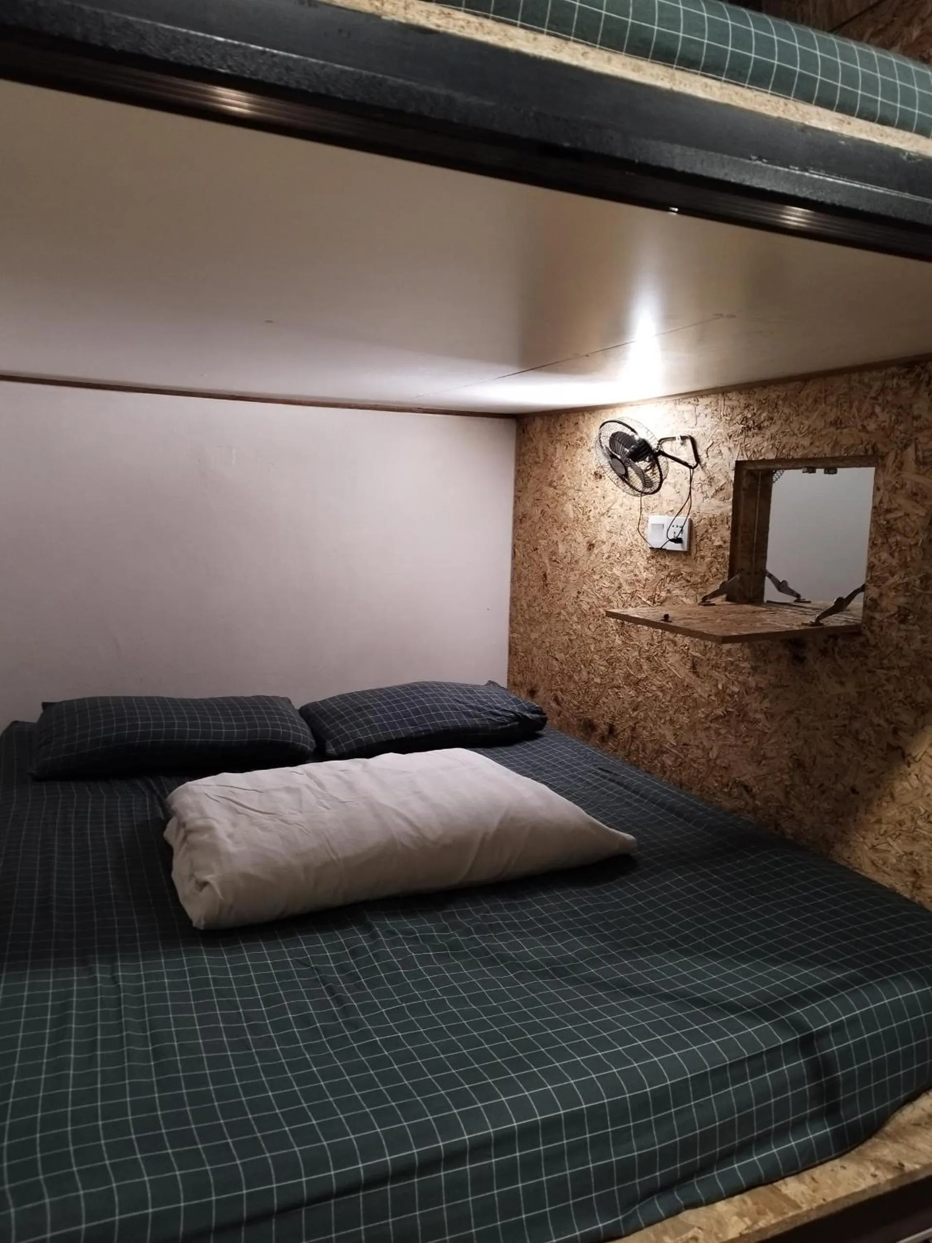 Bed in Sleepbox Hotel