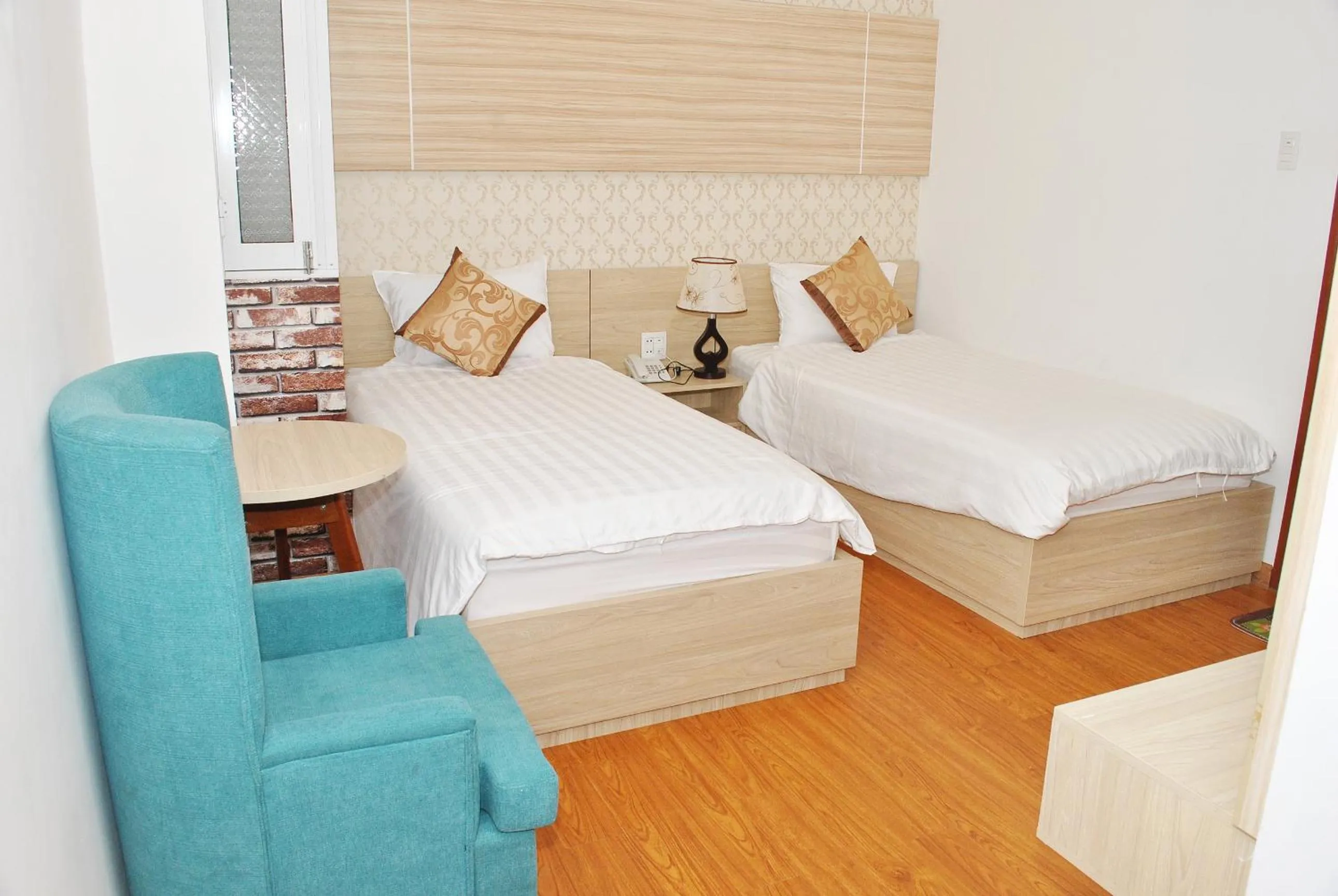 Bed in Phi Long Hotel