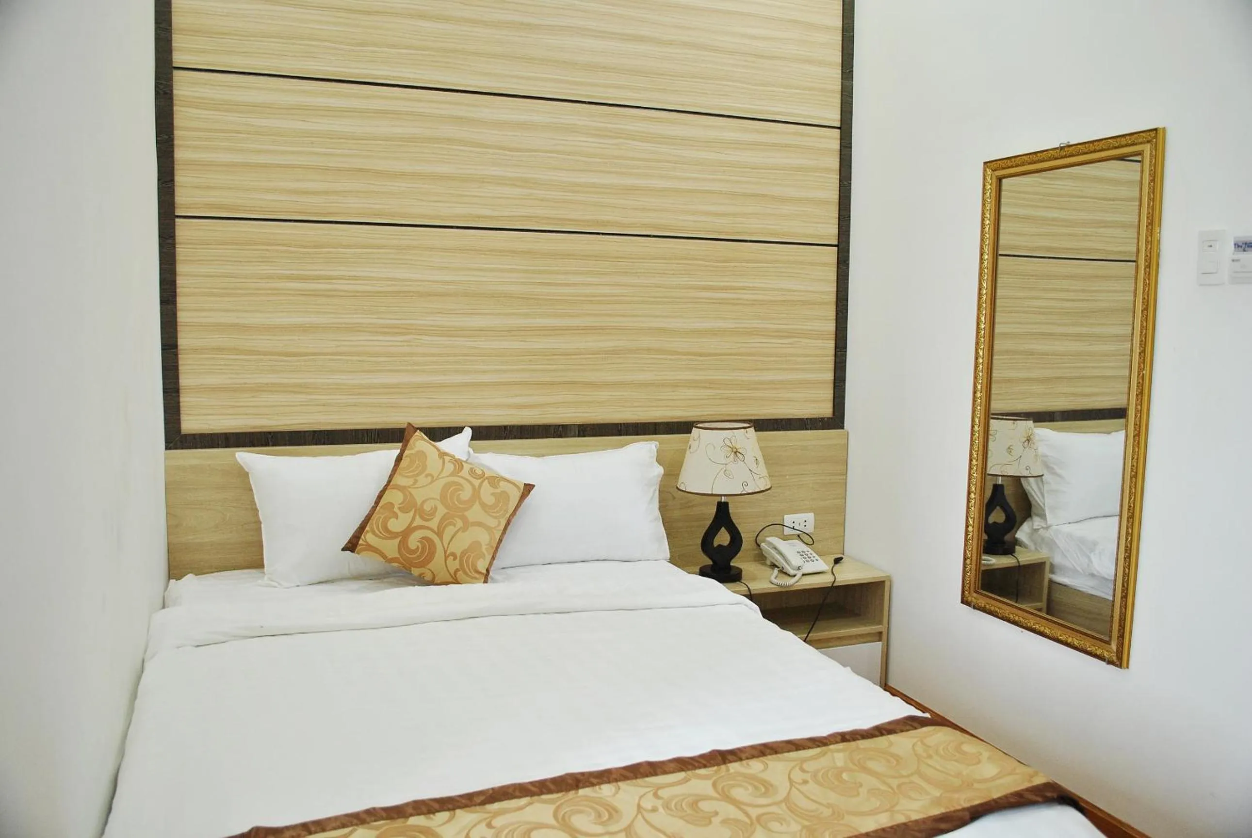 Bed in Phi Long Hotel