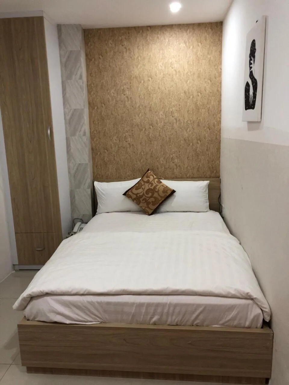 Bed in Phi Long Hotel