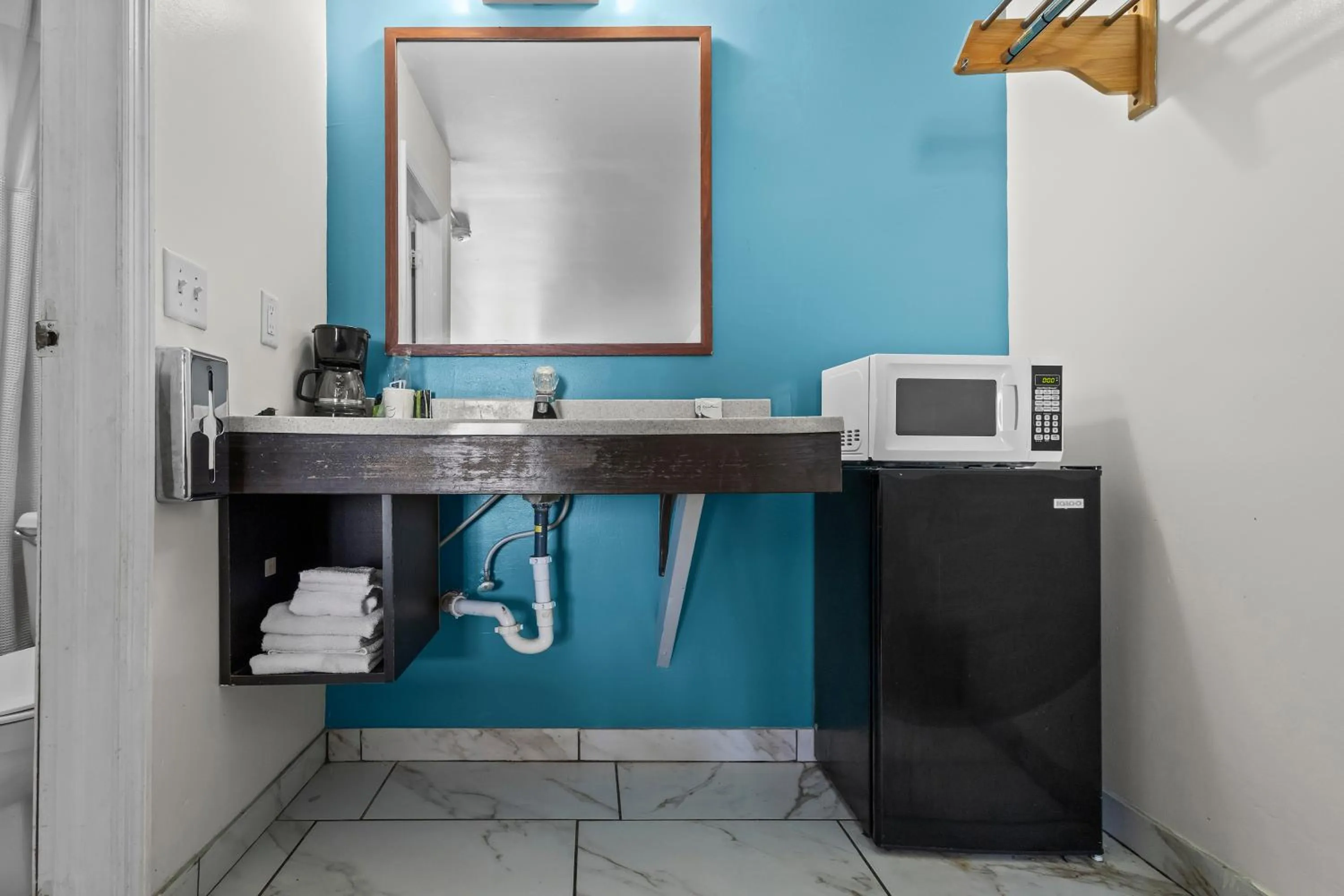 Living room in Capital O First Heritage Inn Rantoul IL I 57