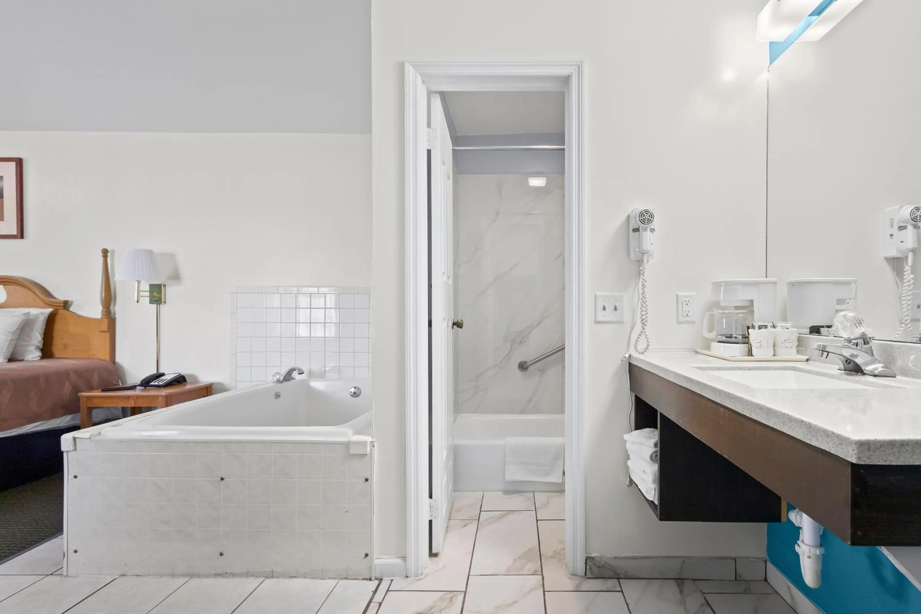 Bedroom in Capital O First Heritage Inn Rantoul IL I 57