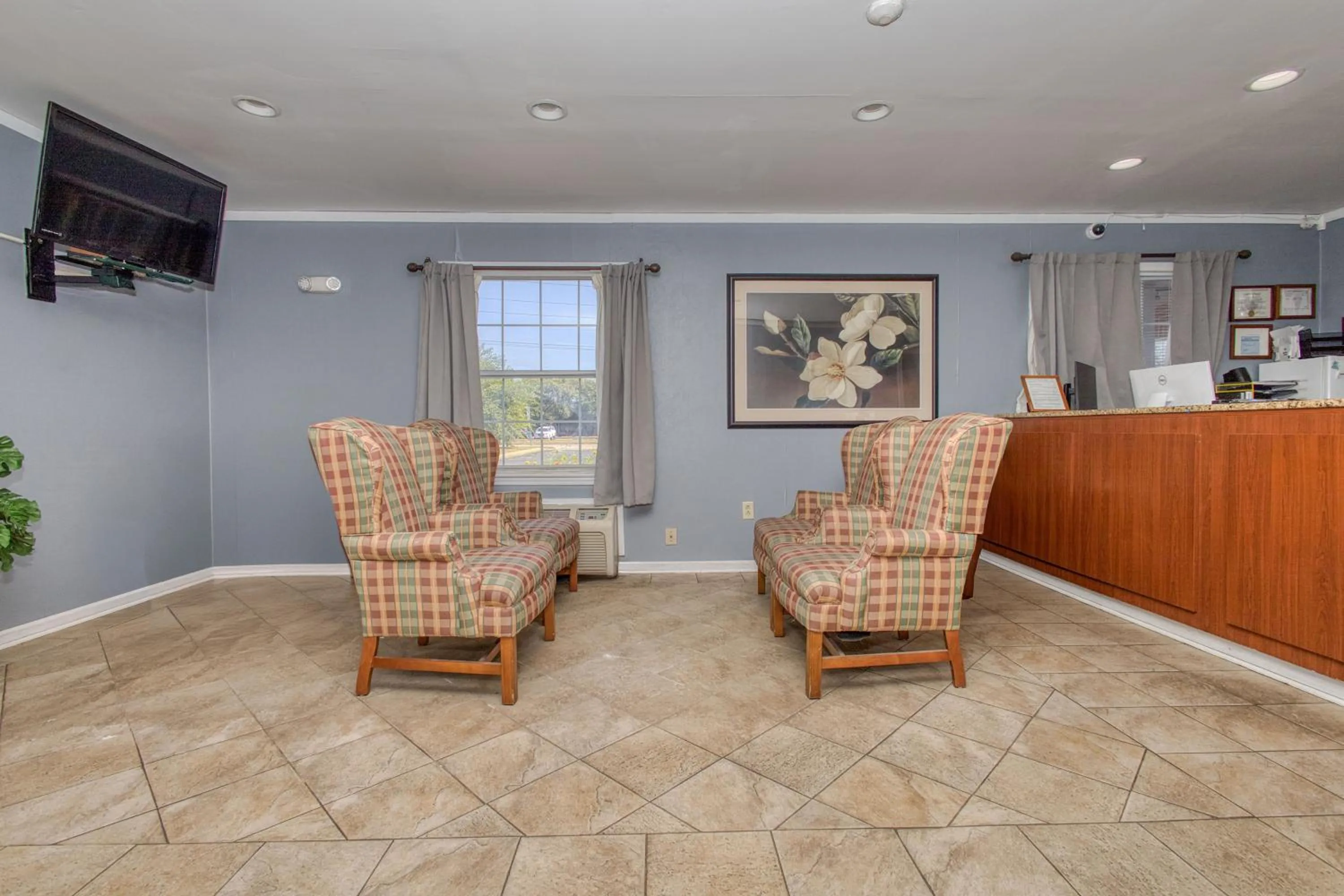 Lobby or reception in Capital O First Heritage Inn Rantoul IL I 57