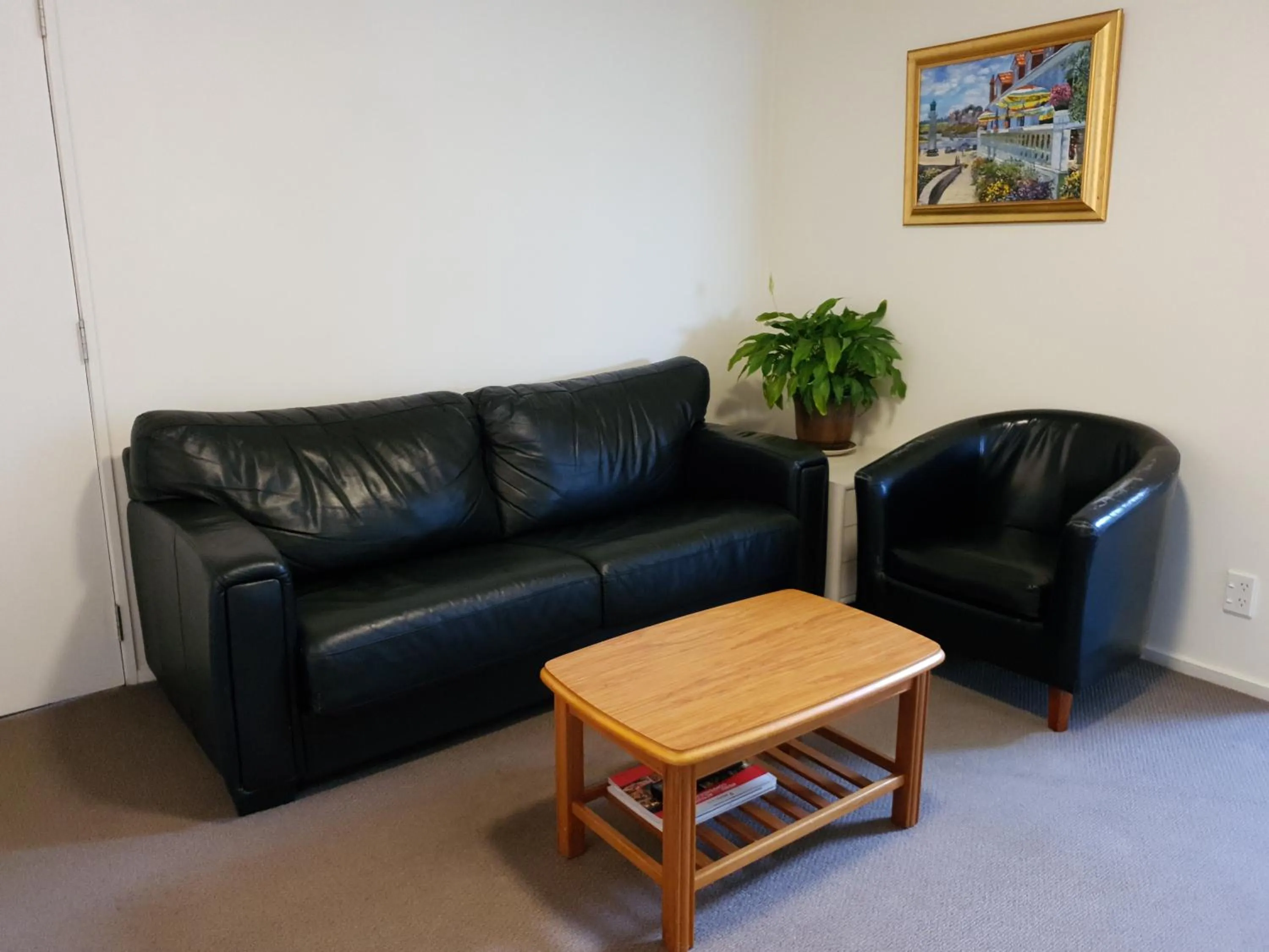 Living room in Rosewood Court Motel