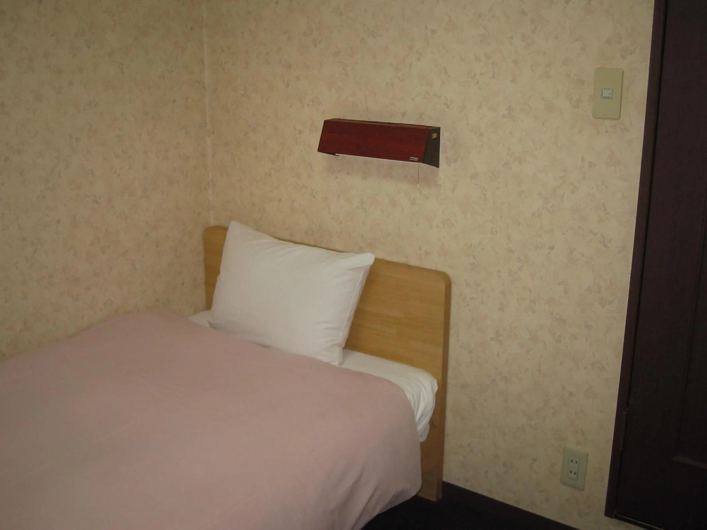 Bed in Sunplaza Rinkai