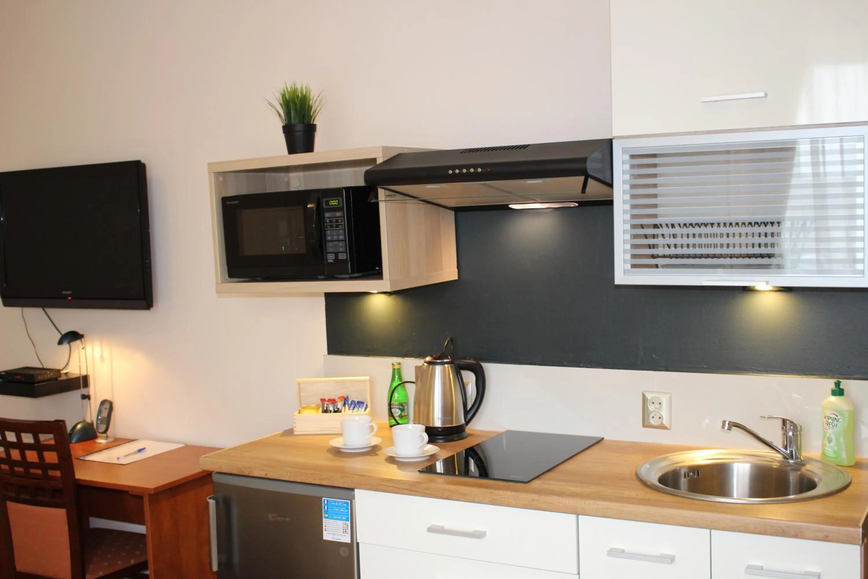 Kitchen or kitchenette in Hotel 1