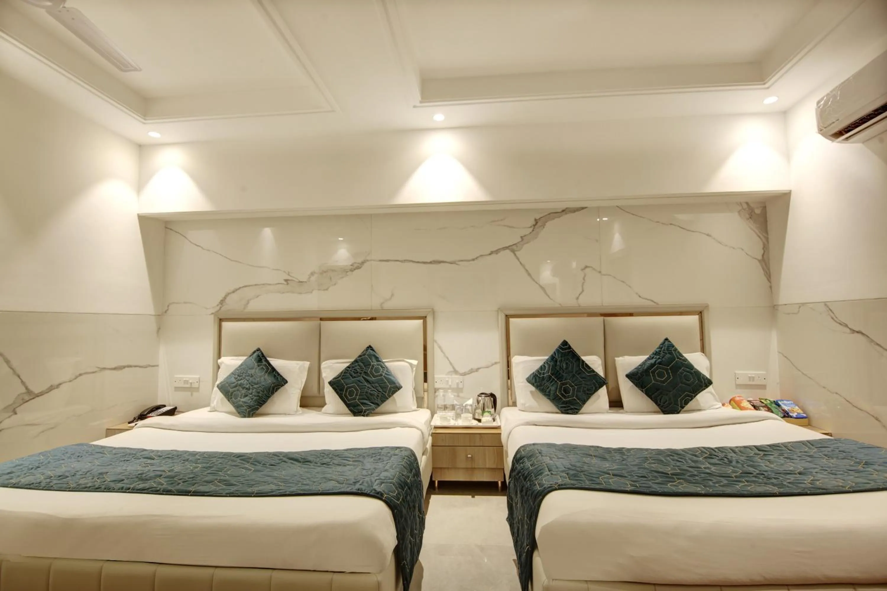 Photo of the whole room, Bed in Hotel International Inn - Near Delhi Airport