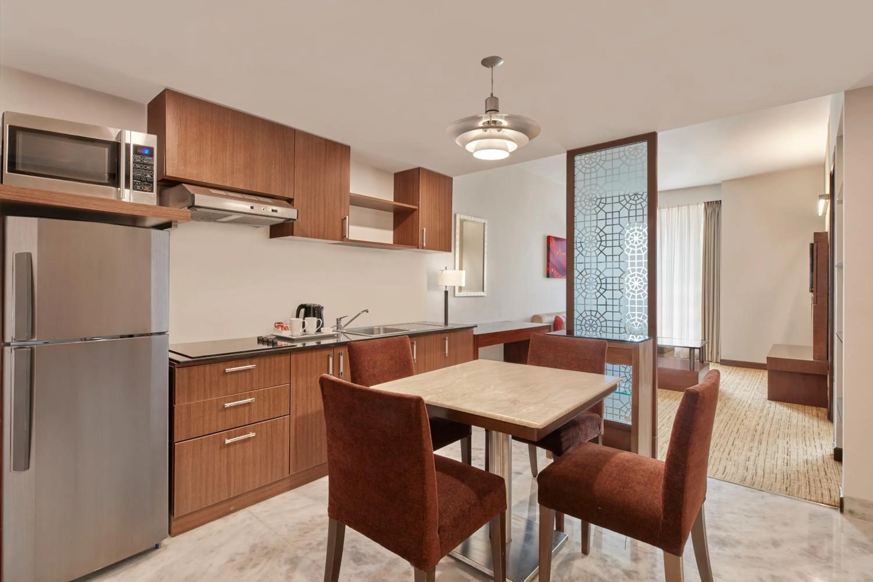 Kitchen or kitchenette in Four Points by Sheraton Hotel and Serviced Apartments Pune