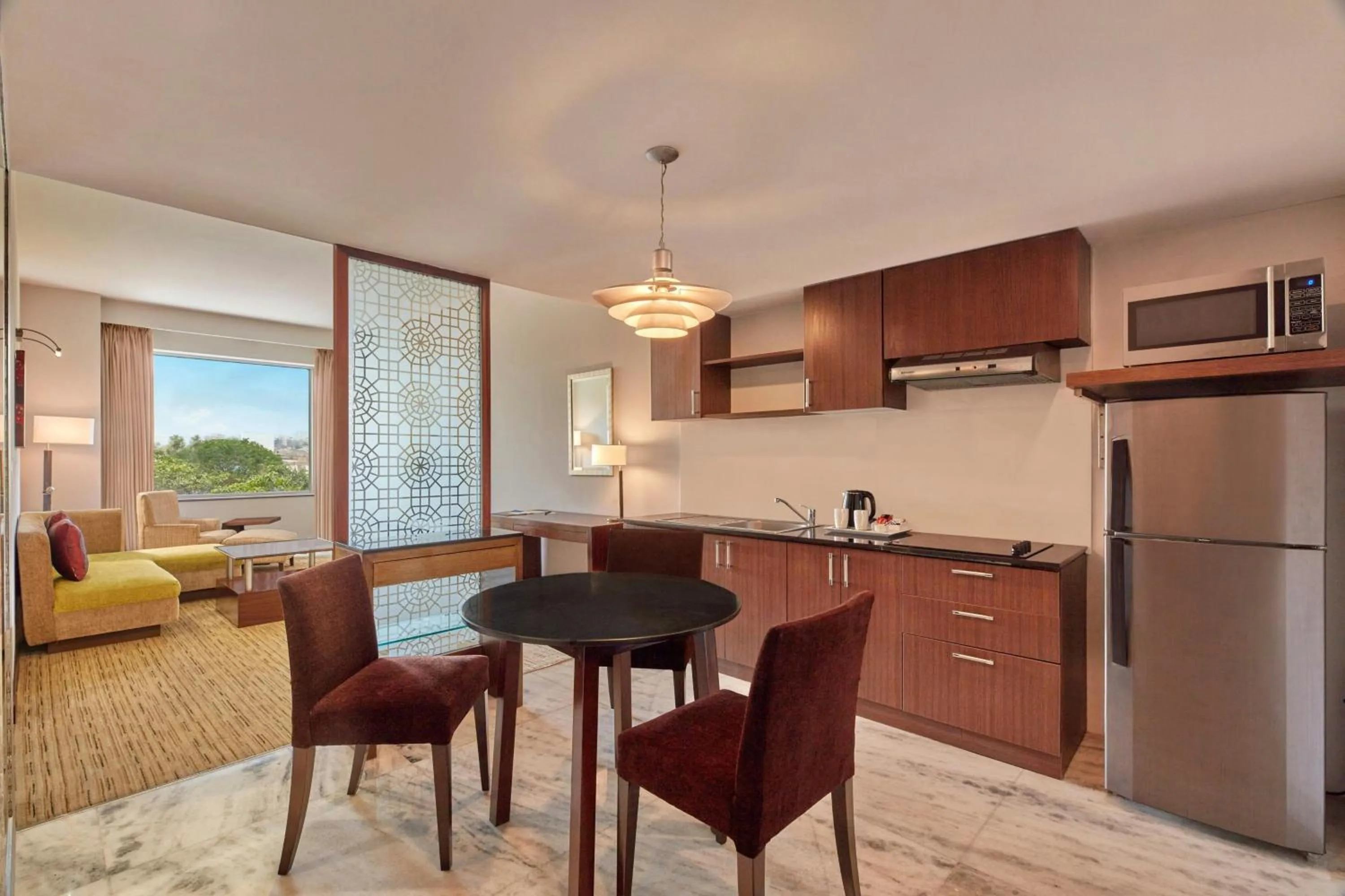 Kitchen or kitchenette in Four Points by Sheraton Hotel and Serviced Apartments Pune