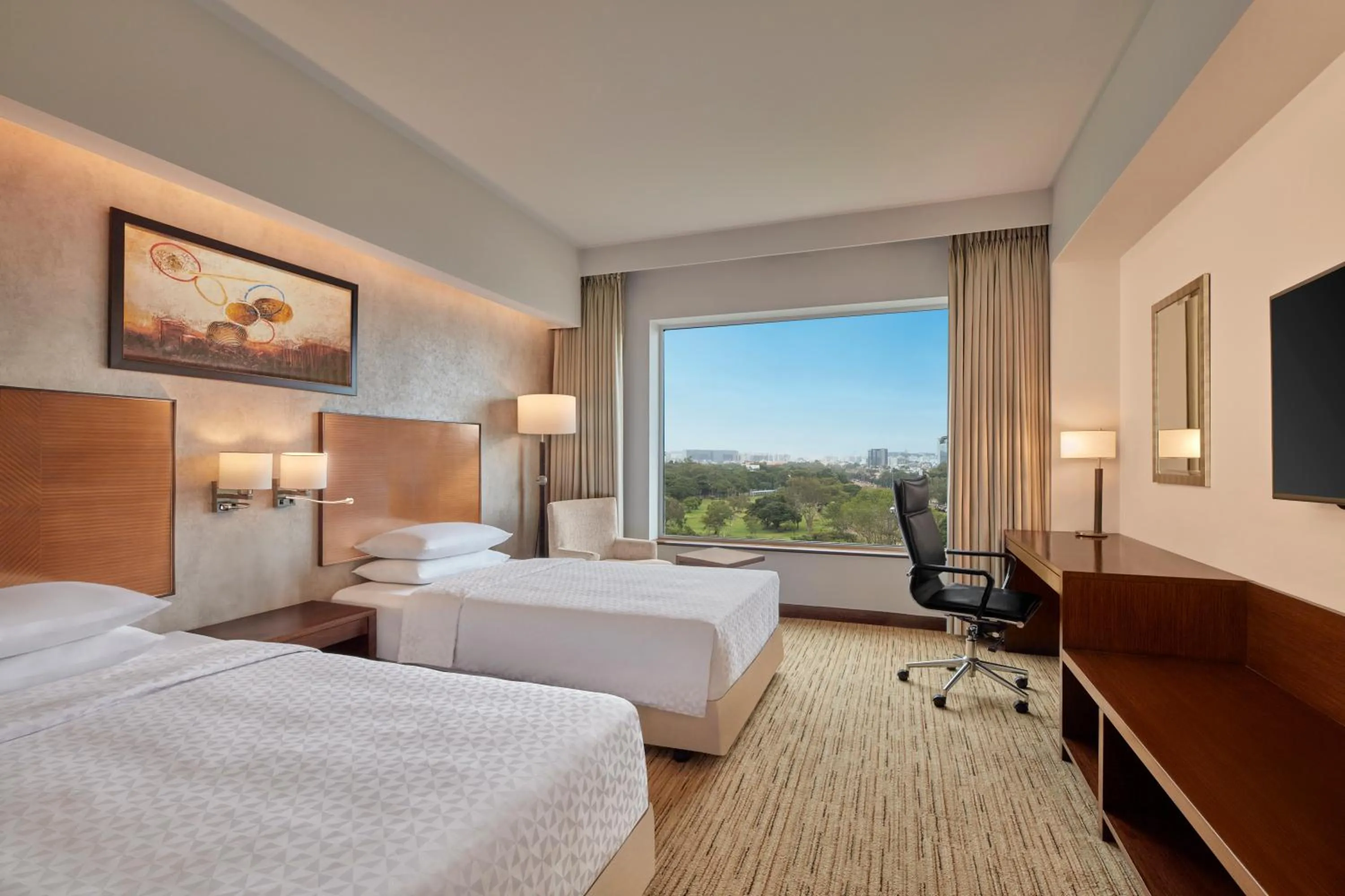 Bed in Four Points by Sheraton Hotel and Serviced Apartments Pune