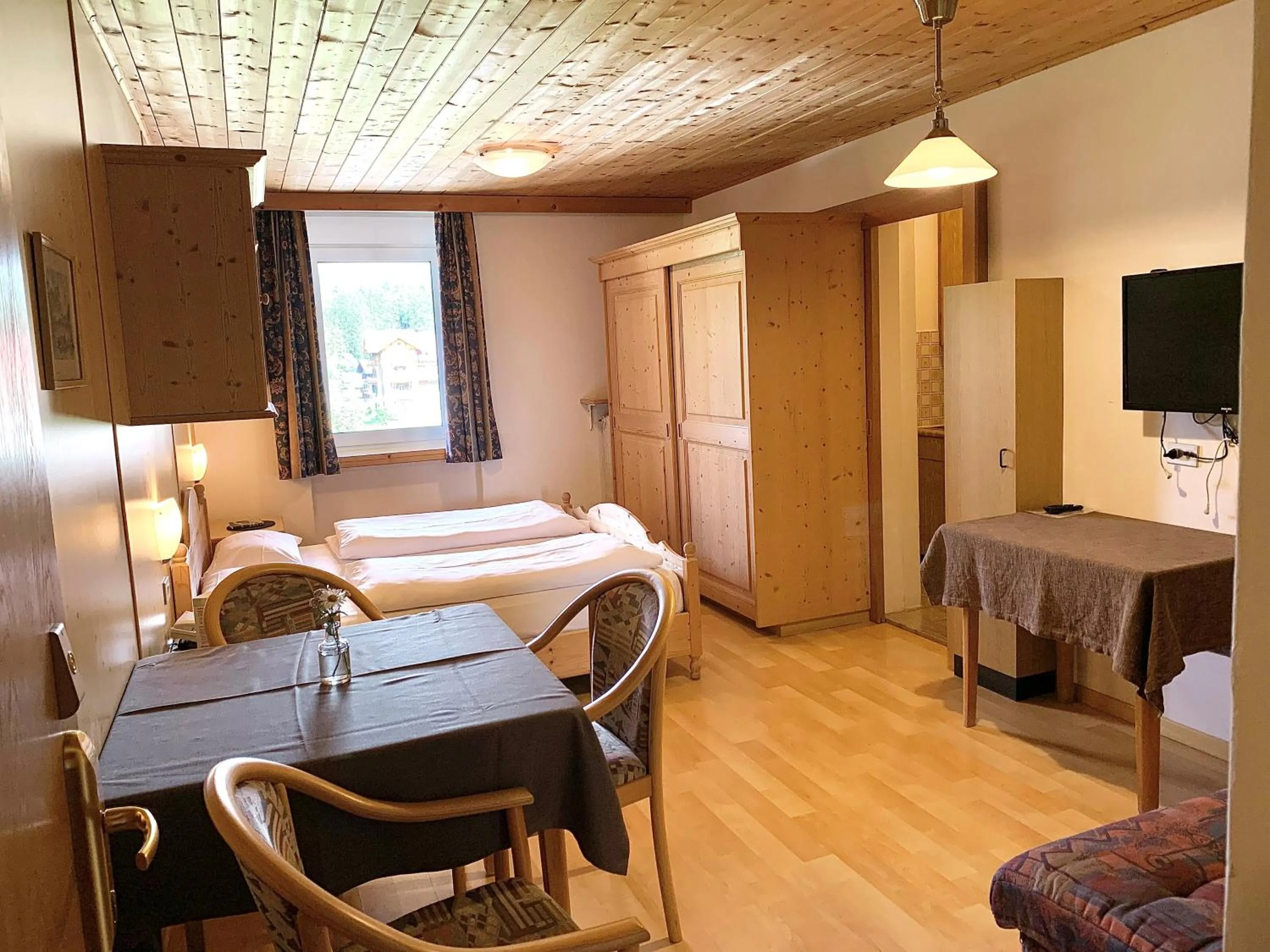 Bed in Apparthotel Germania