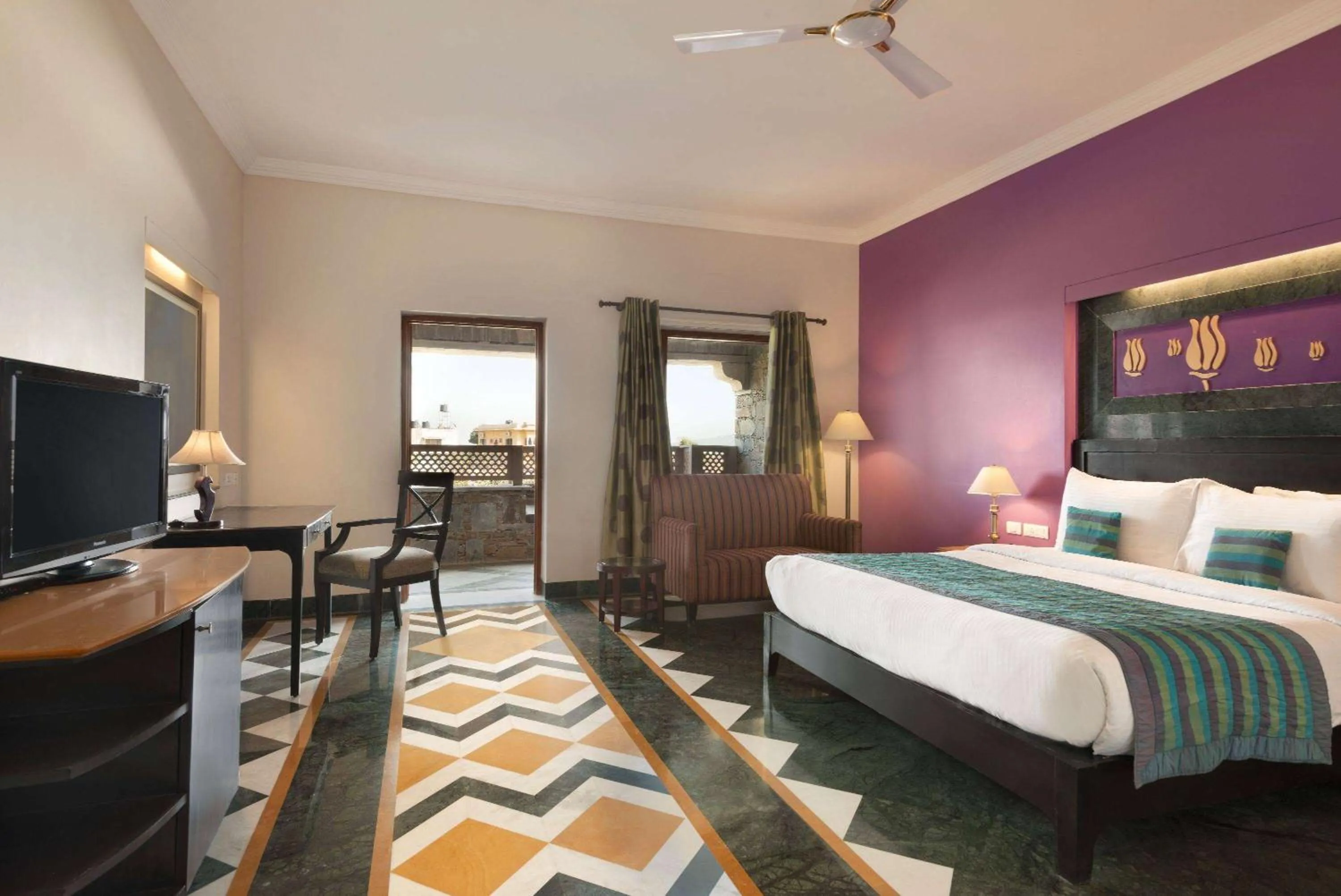 Photo of the whole room, Bed in Ramada by Wyndham Udaipur Resort and Spa