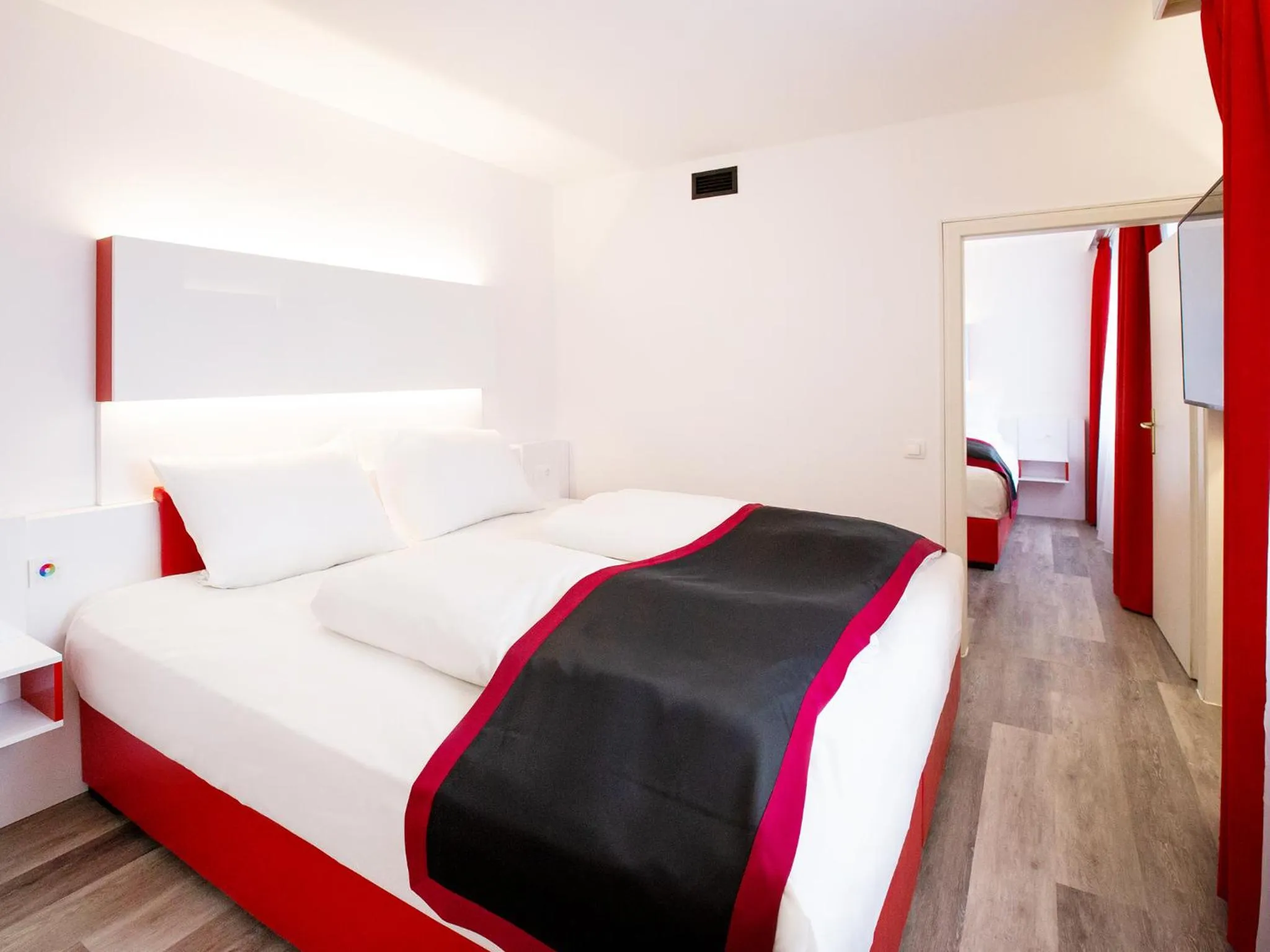 Photo of the whole room, Bed in DORMERO Hotel Burghausen