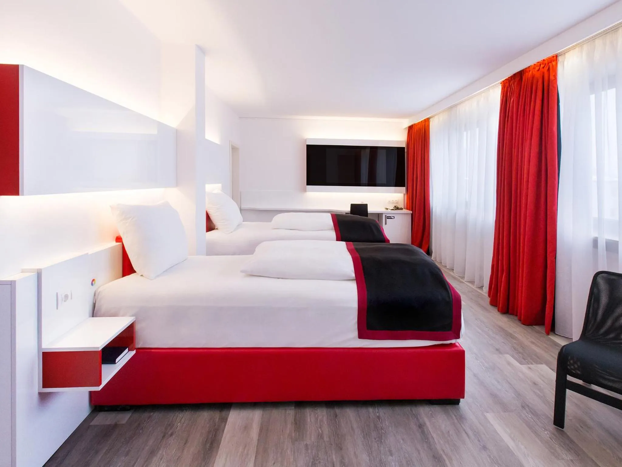 Photo of the whole room, Bed in DORMERO Hotel Burghausen