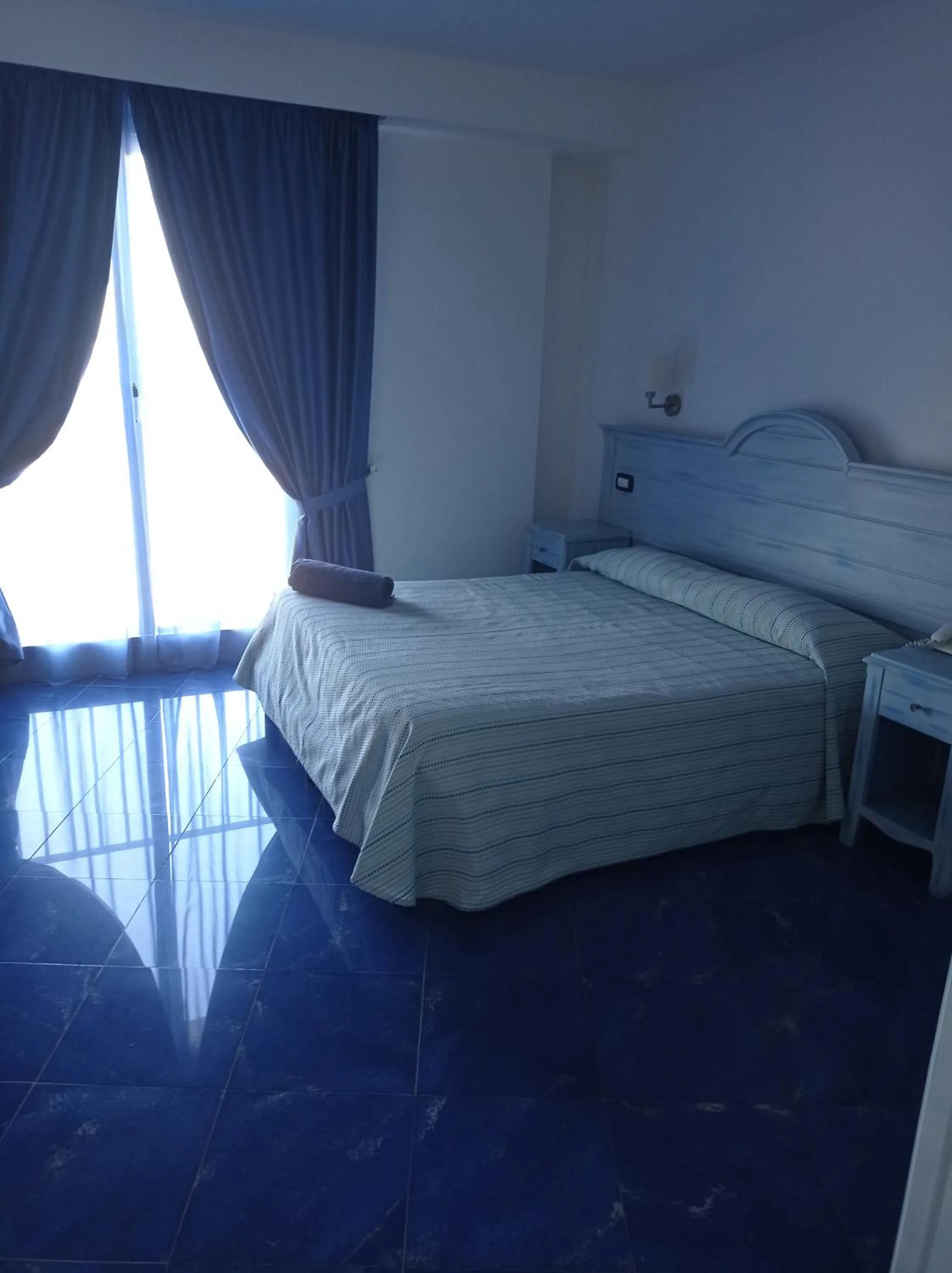 Bed in Blue Moon Hotel
