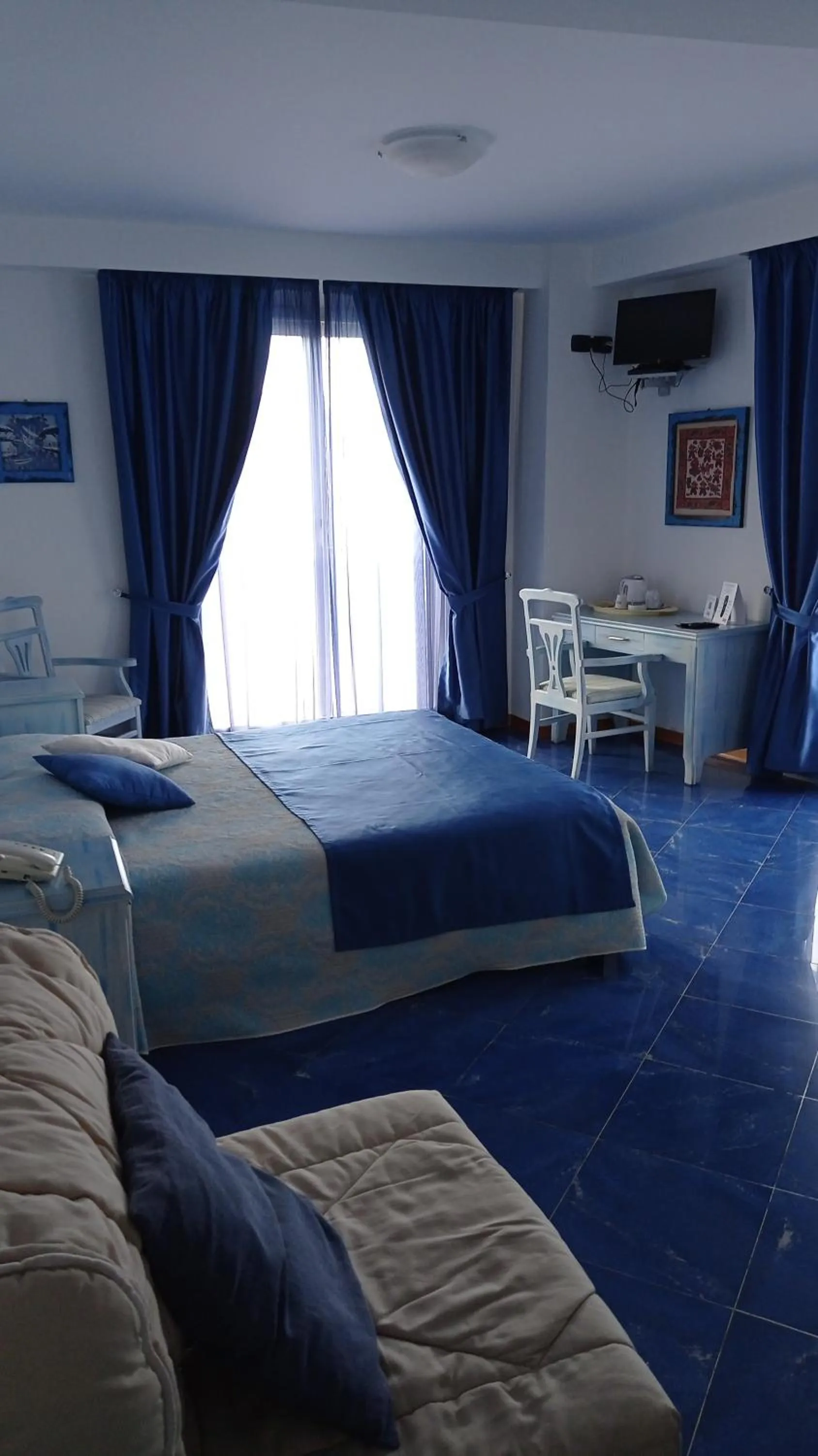 Bed in Blue Moon Hotel