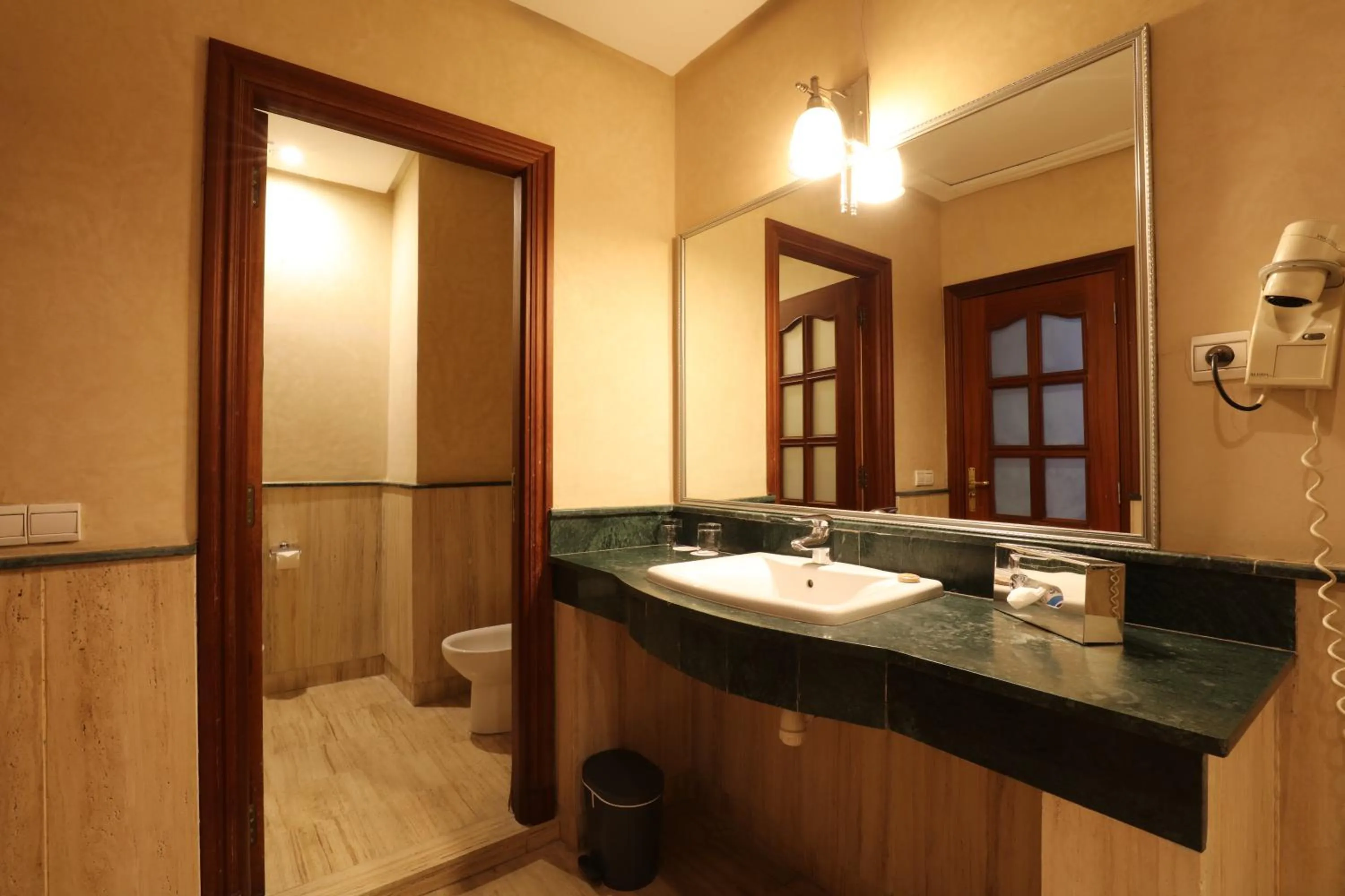 Bathroom in Hôtel Les Saisons