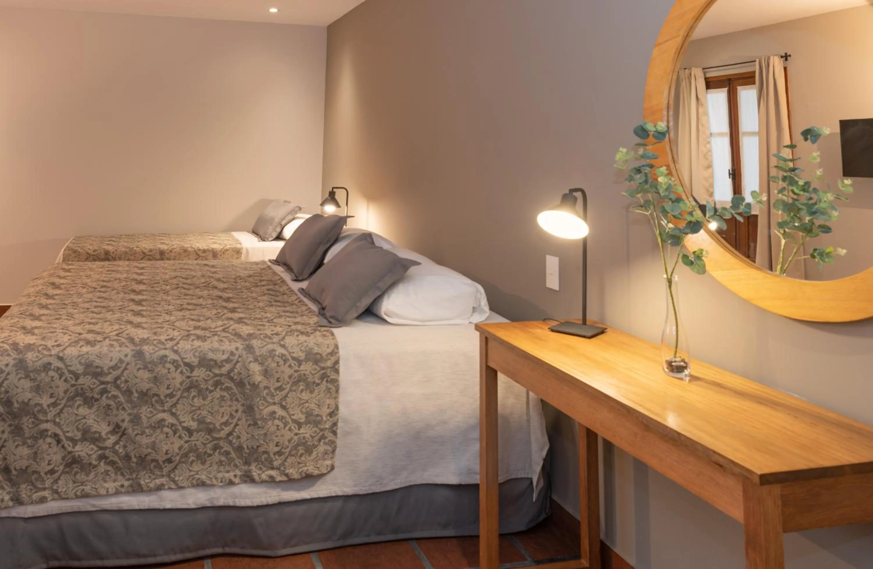 Bed in El Arribo Hotel