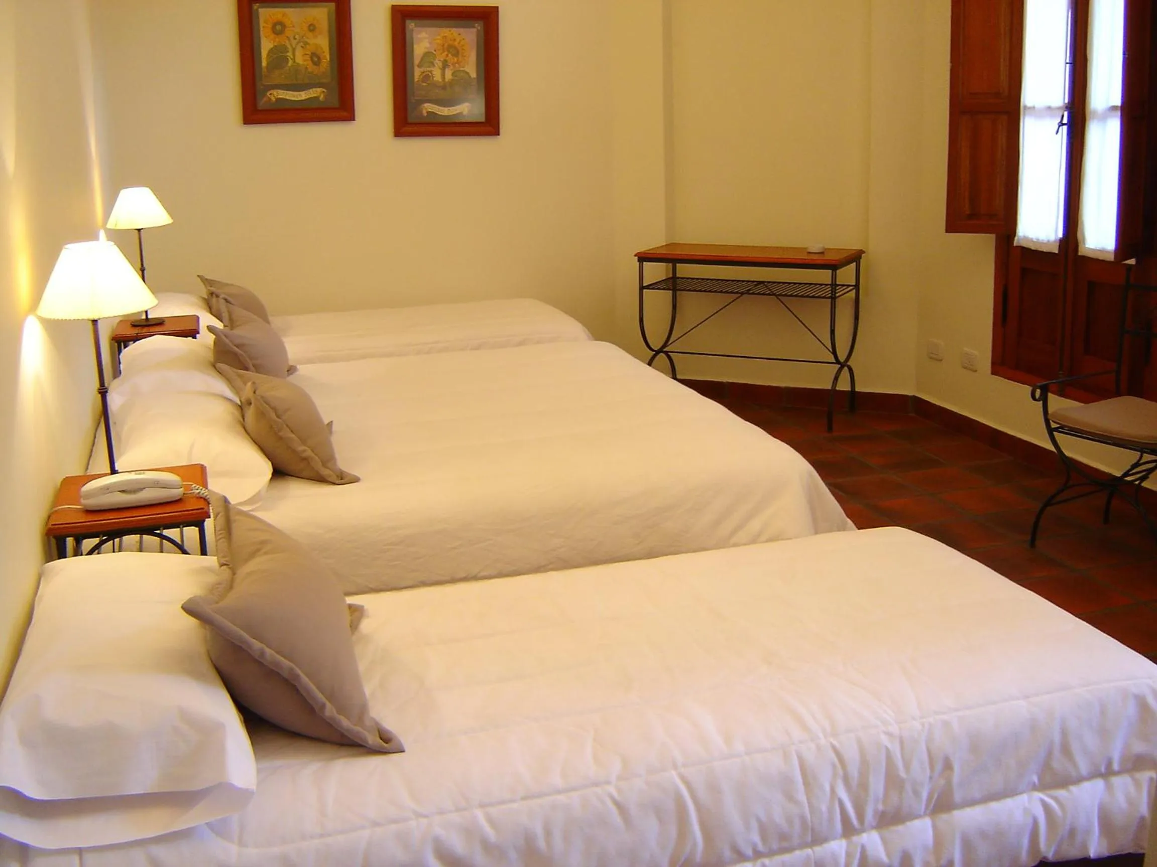 Bed in El Arribo Hotel