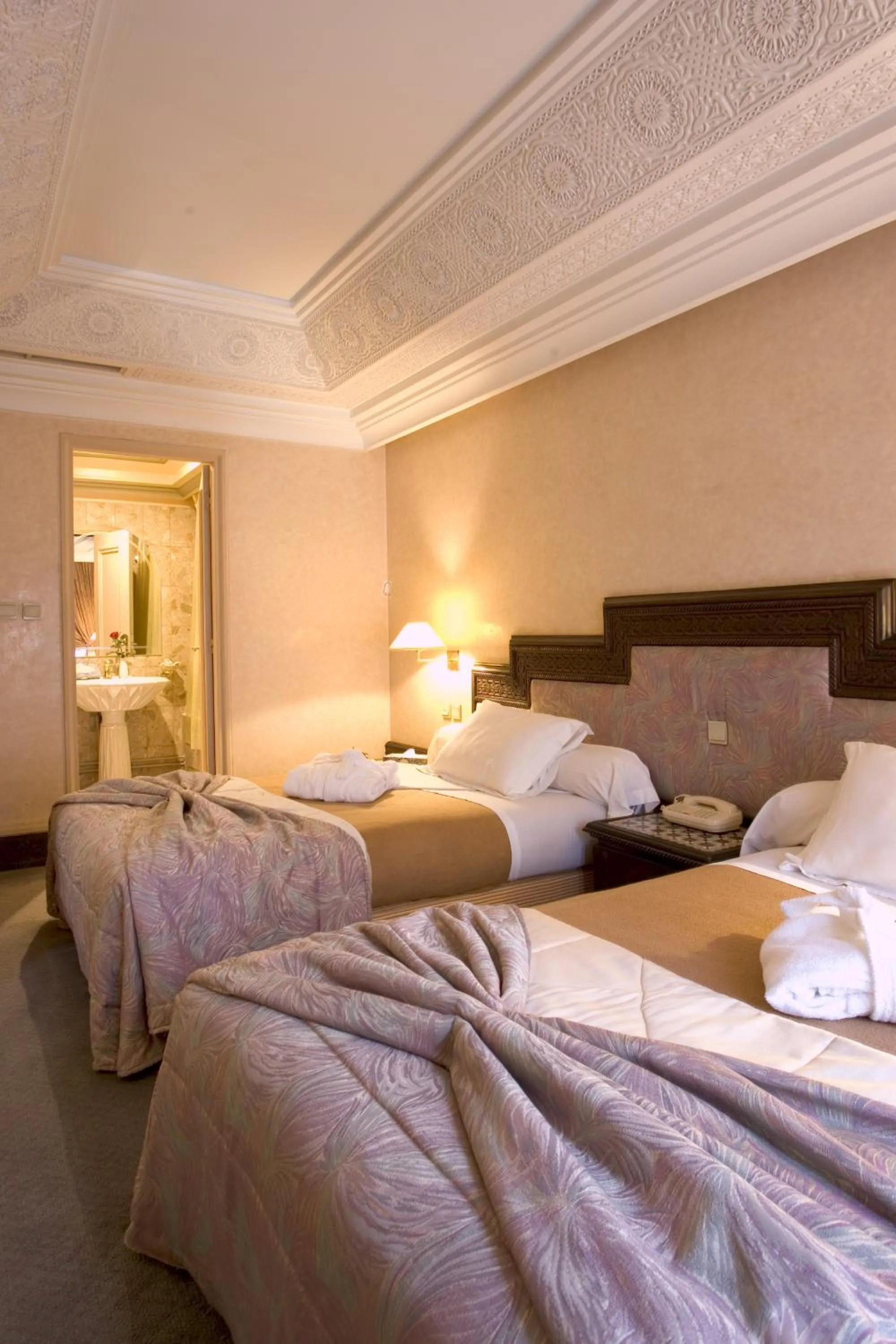 Photo of the whole room, Bed in Nassim Hôtel