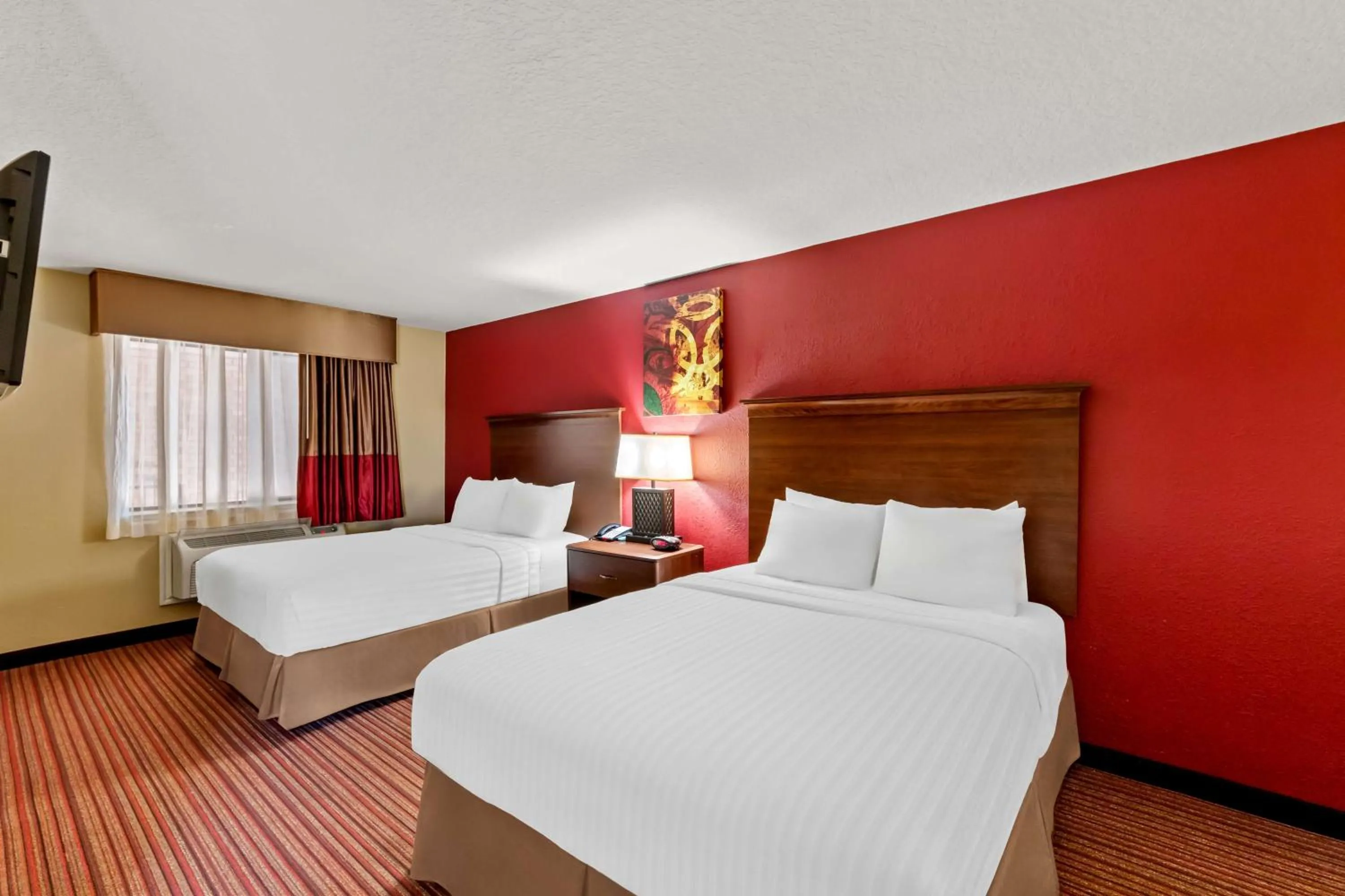 Bedroom, Bed in SureStay Plus by Best Western San Antonio Fiesta Inn