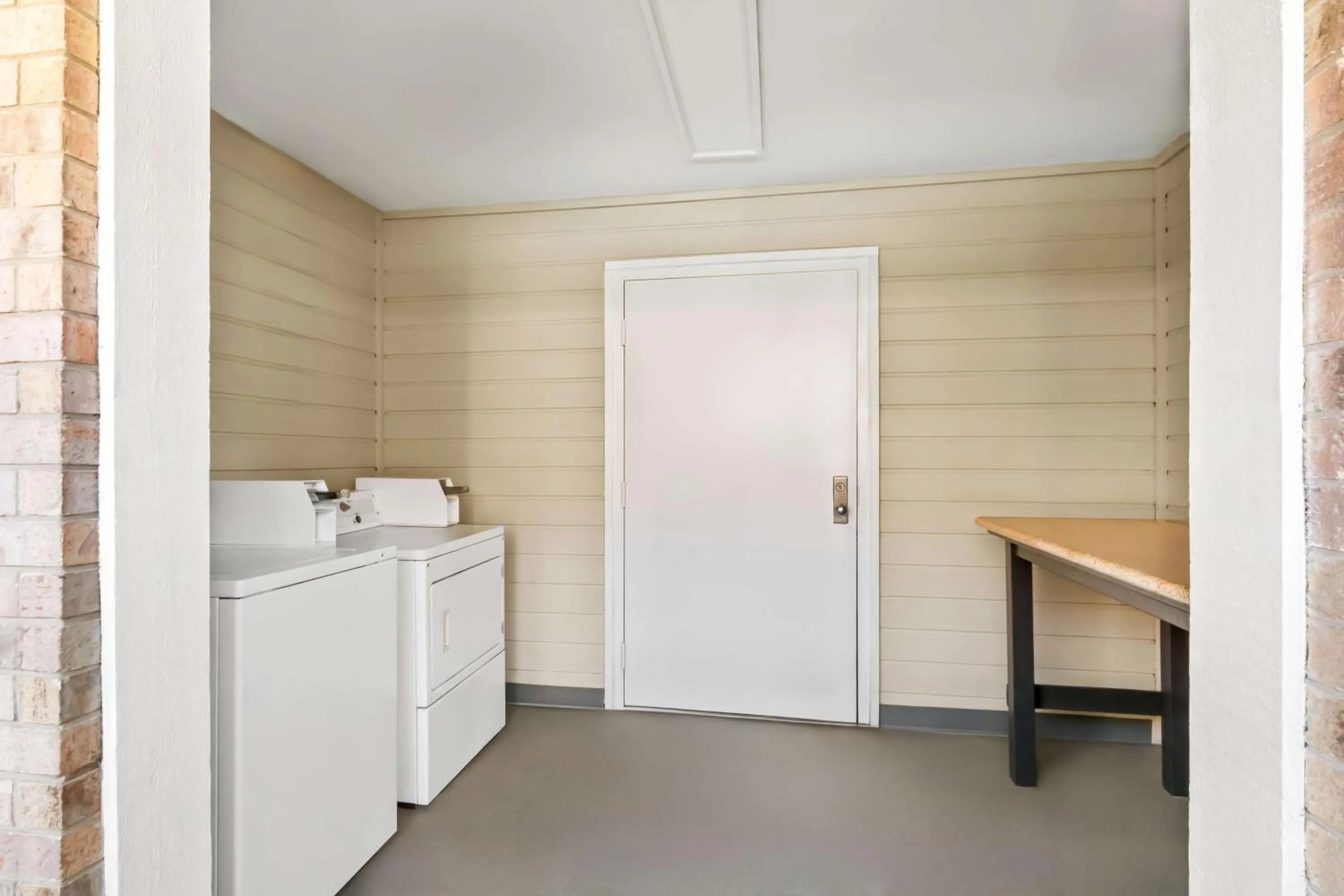 Property building in SureStay Plus by Best Western San Antonio Fiesta Inn