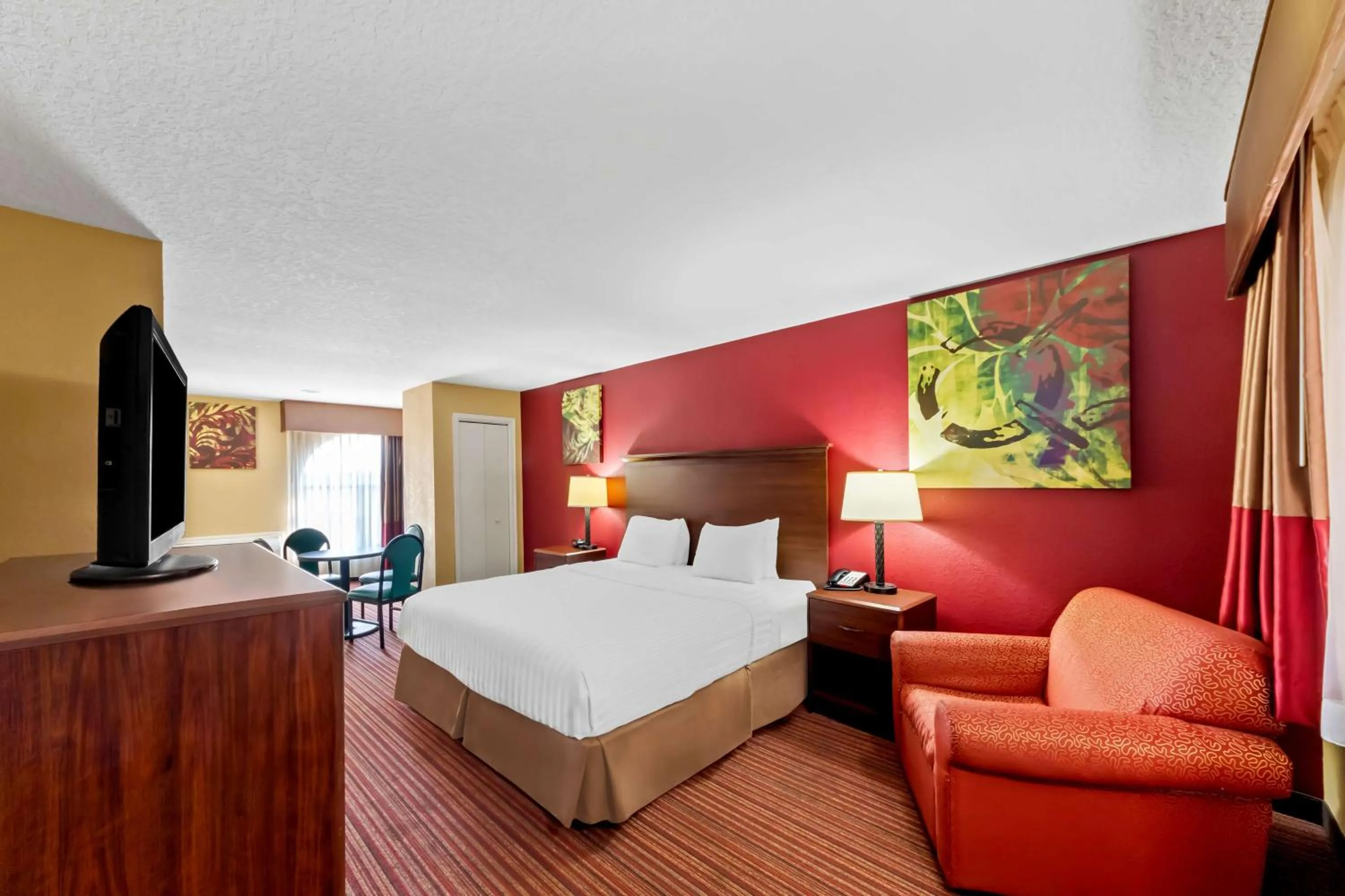 Bedroom, Bed in SureStay Plus by Best Western San Antonio Fiesta Inn