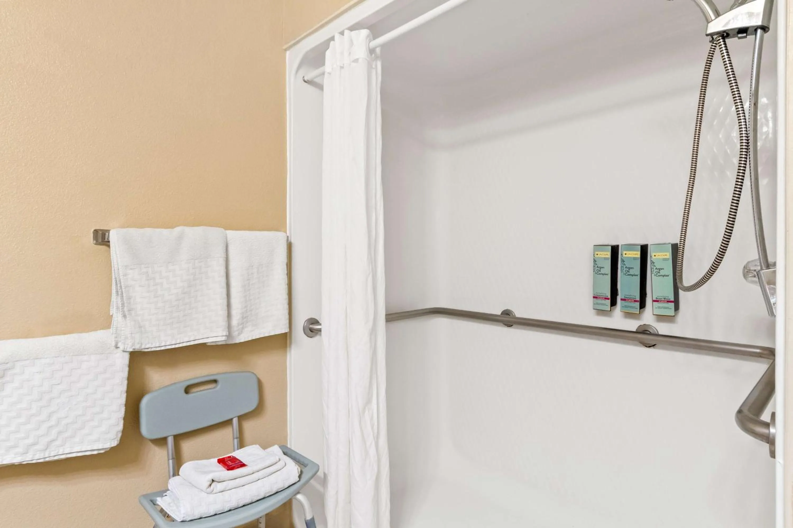 Bathroom in SureStay Plus by Best Western San Antonio Fiesta Inn