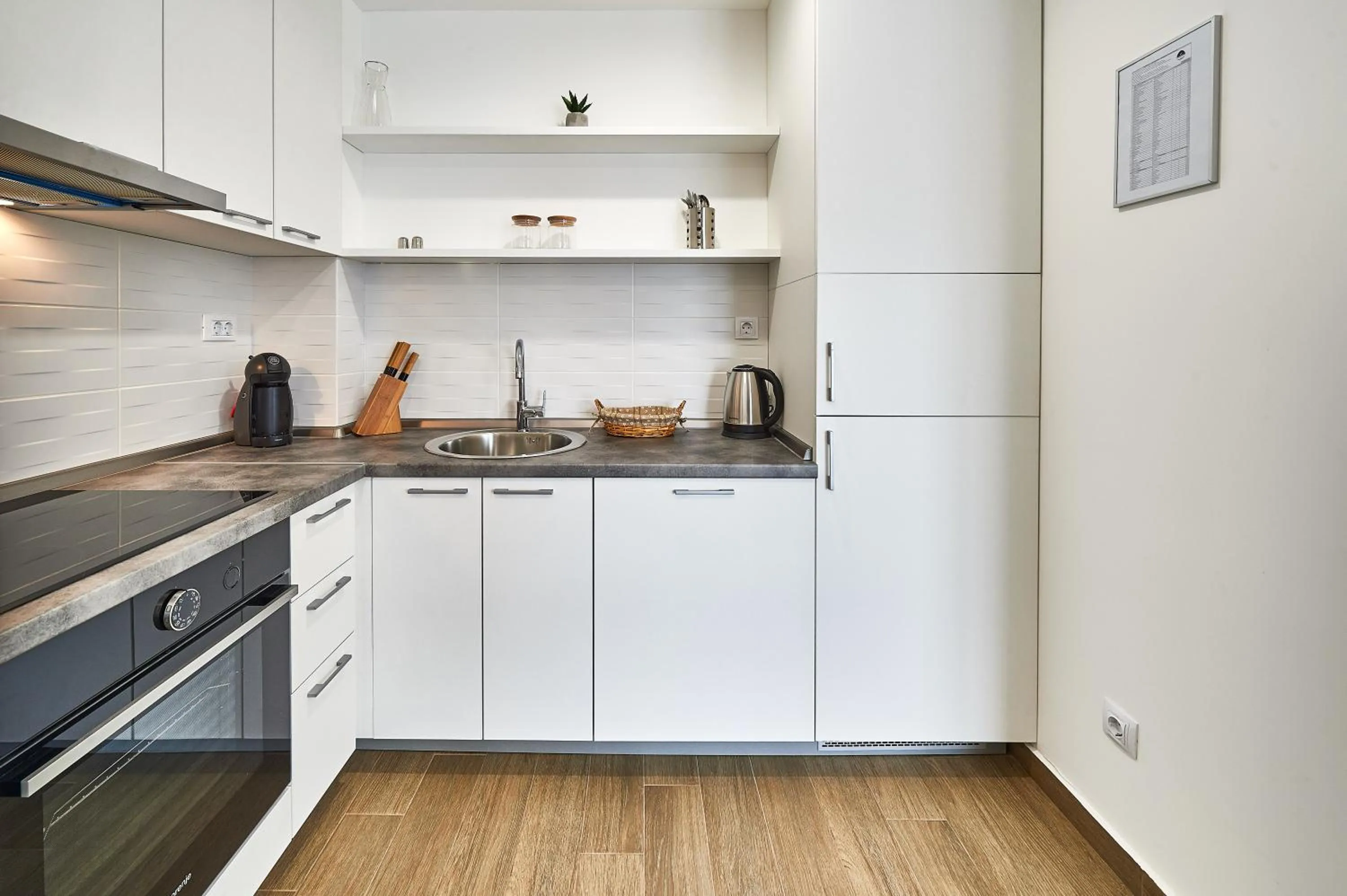 Kitchen or kitchenette in Perla Residence Hotel & SPA