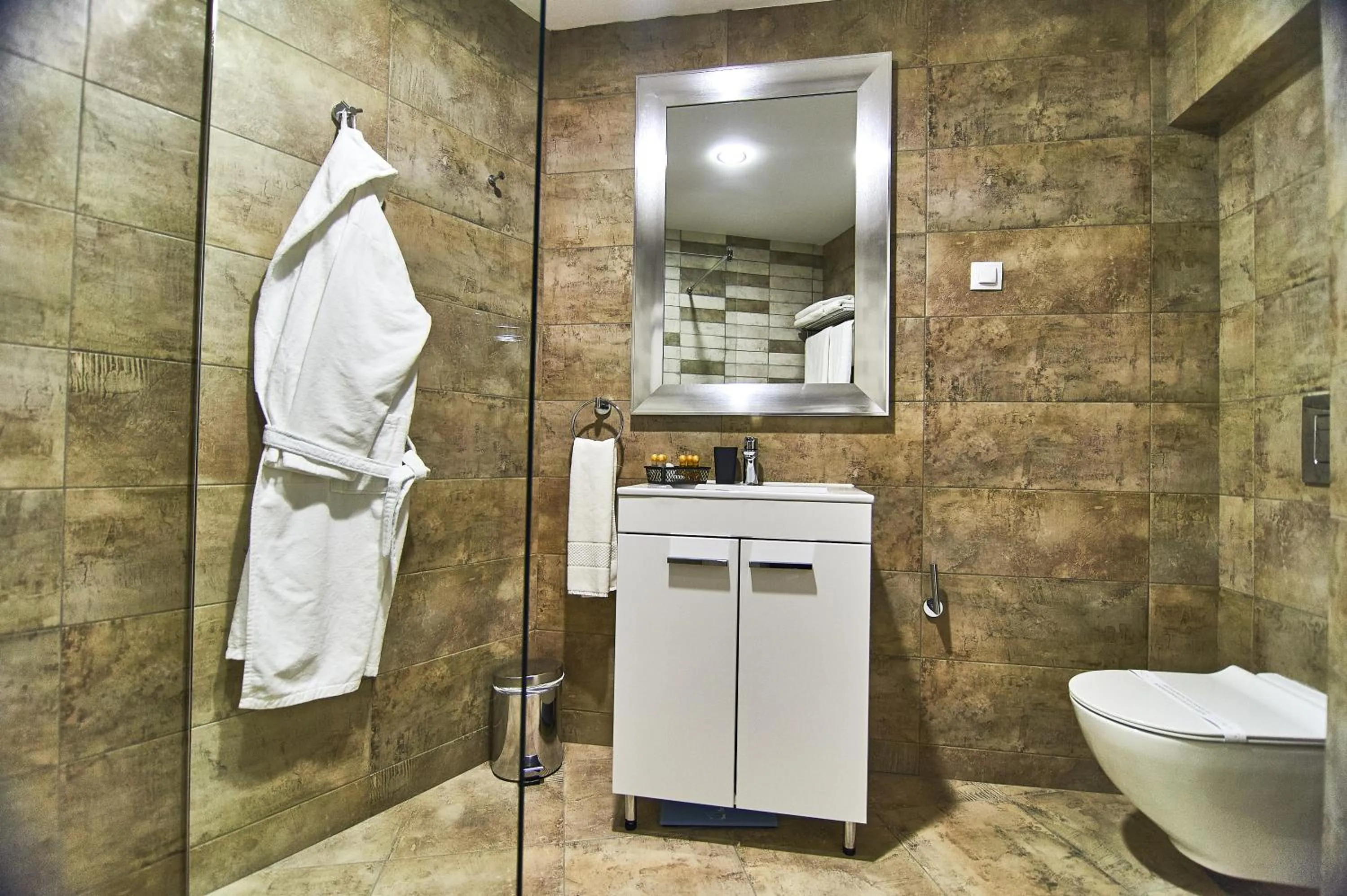Bathroom in Perla Residence Hotel & SPA