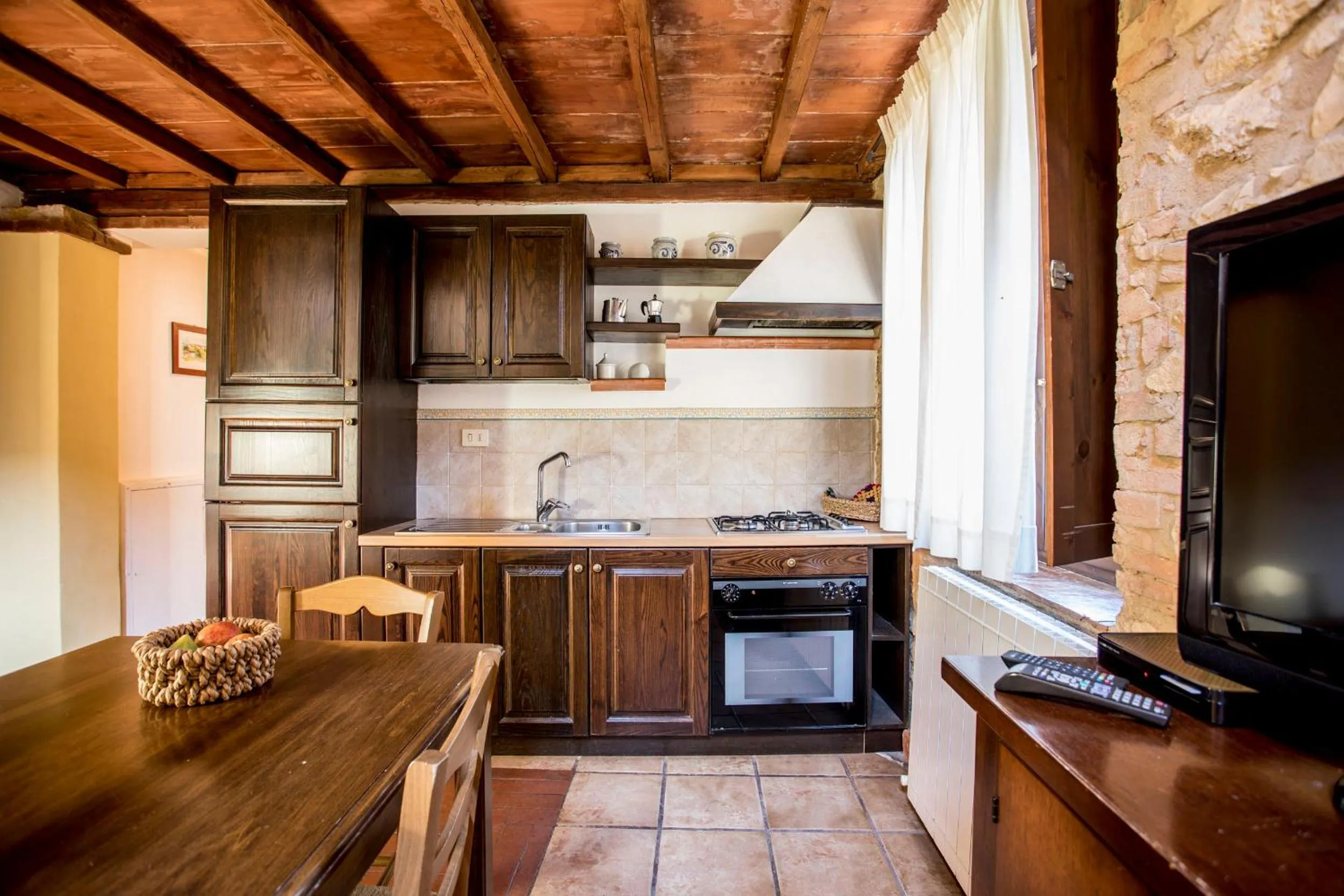 Kitchen or kitchenette in Borgo Il Poggiaccio Residenza Turistico Alberghiera