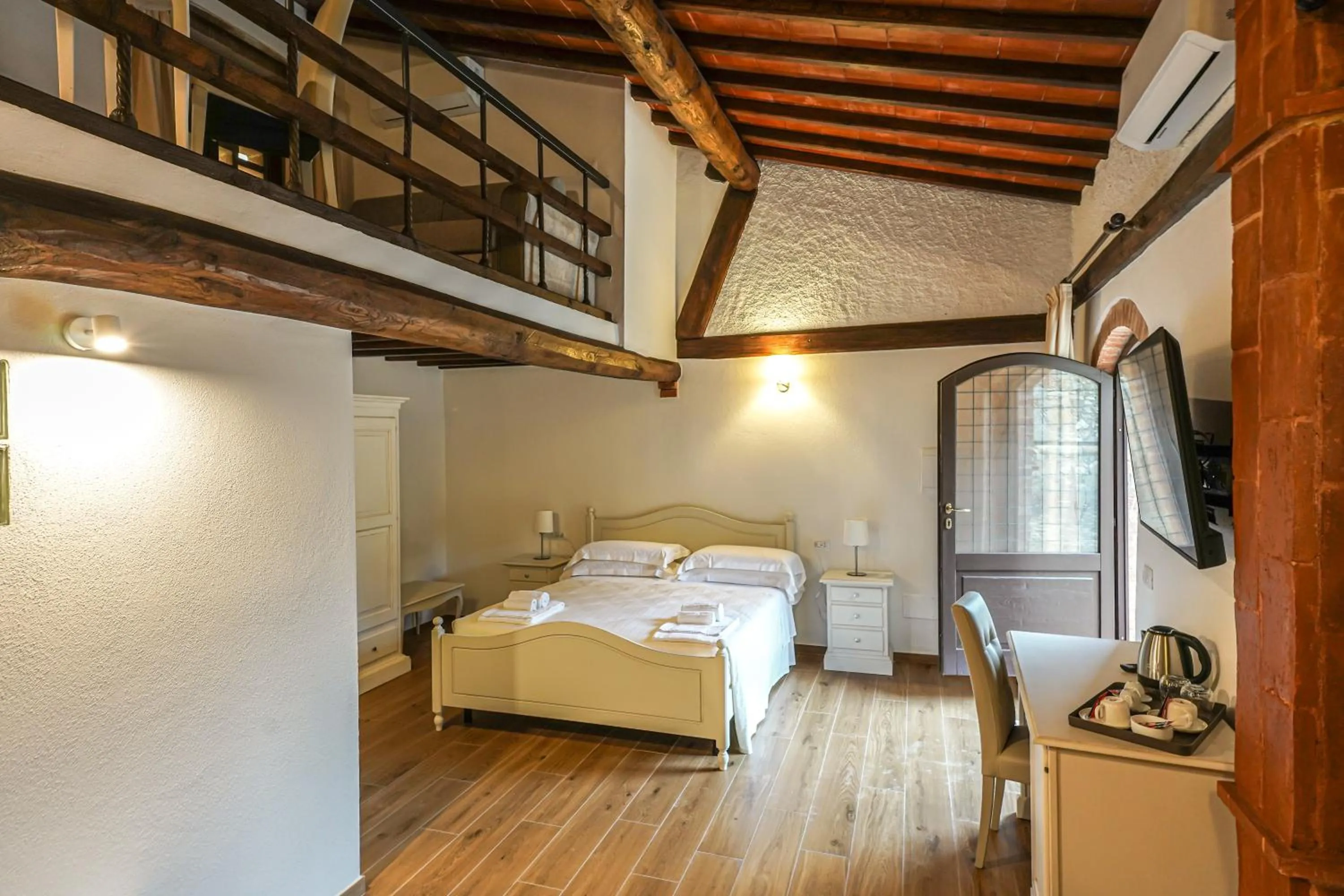 Bedroom, Bed in Borgo Il Poggiaccio Residenza Turistico Alberghiera