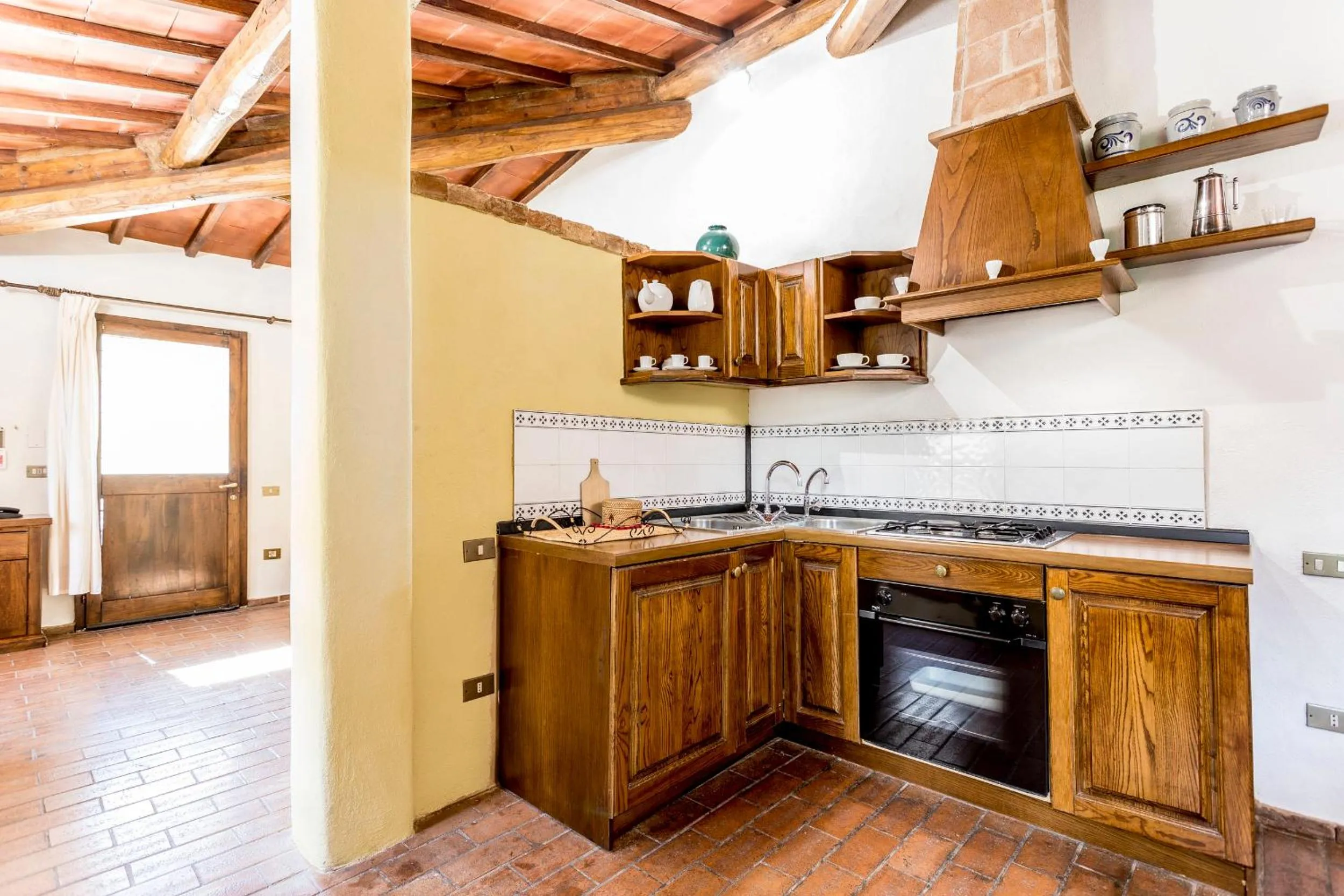 Kitchen or kitchenette in Borgo Il Poggiaccio Residenza Turistico Alberghiera