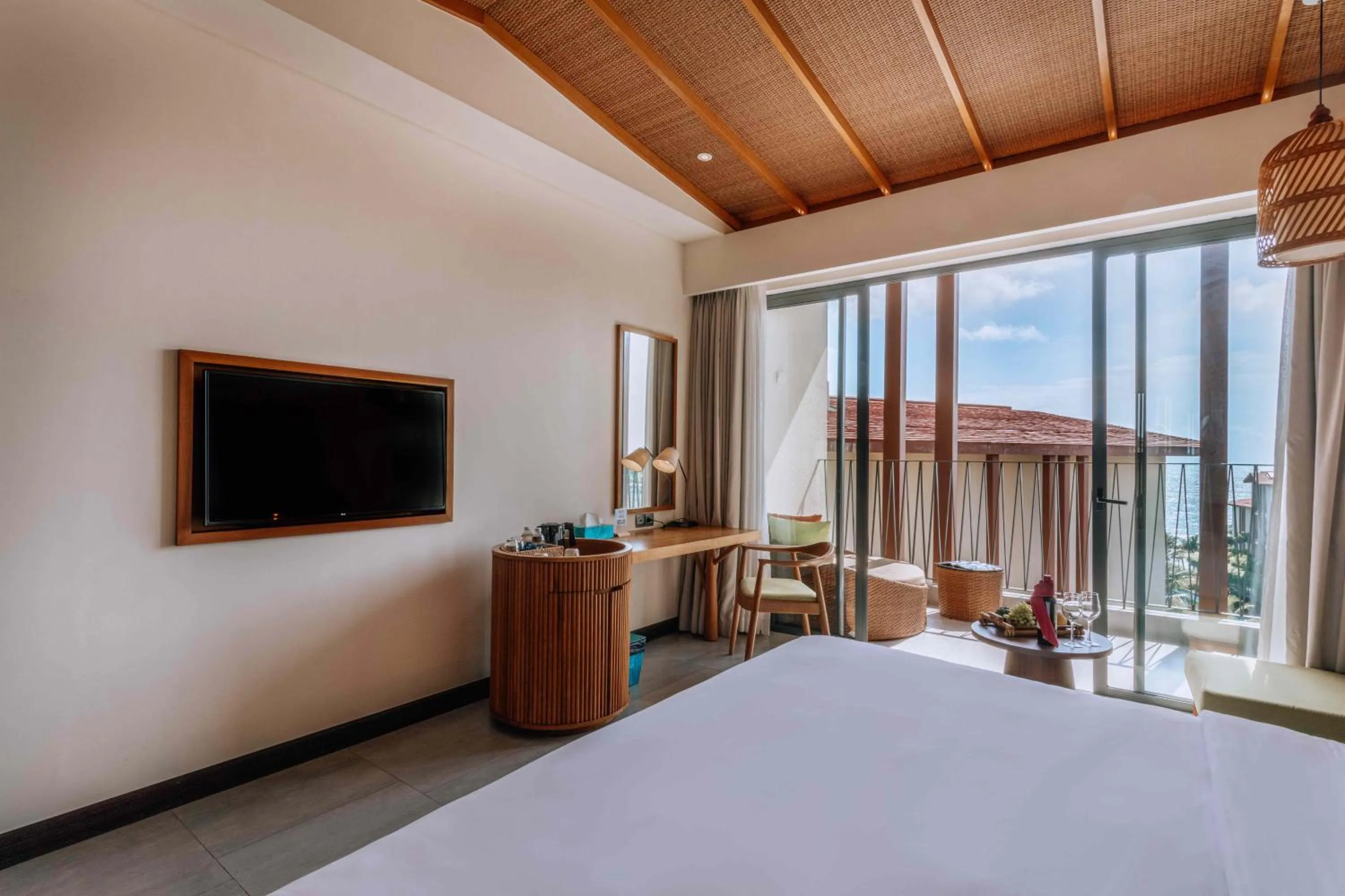 Garden view, Bed in Dusit Princess Moonrise Beach Resort