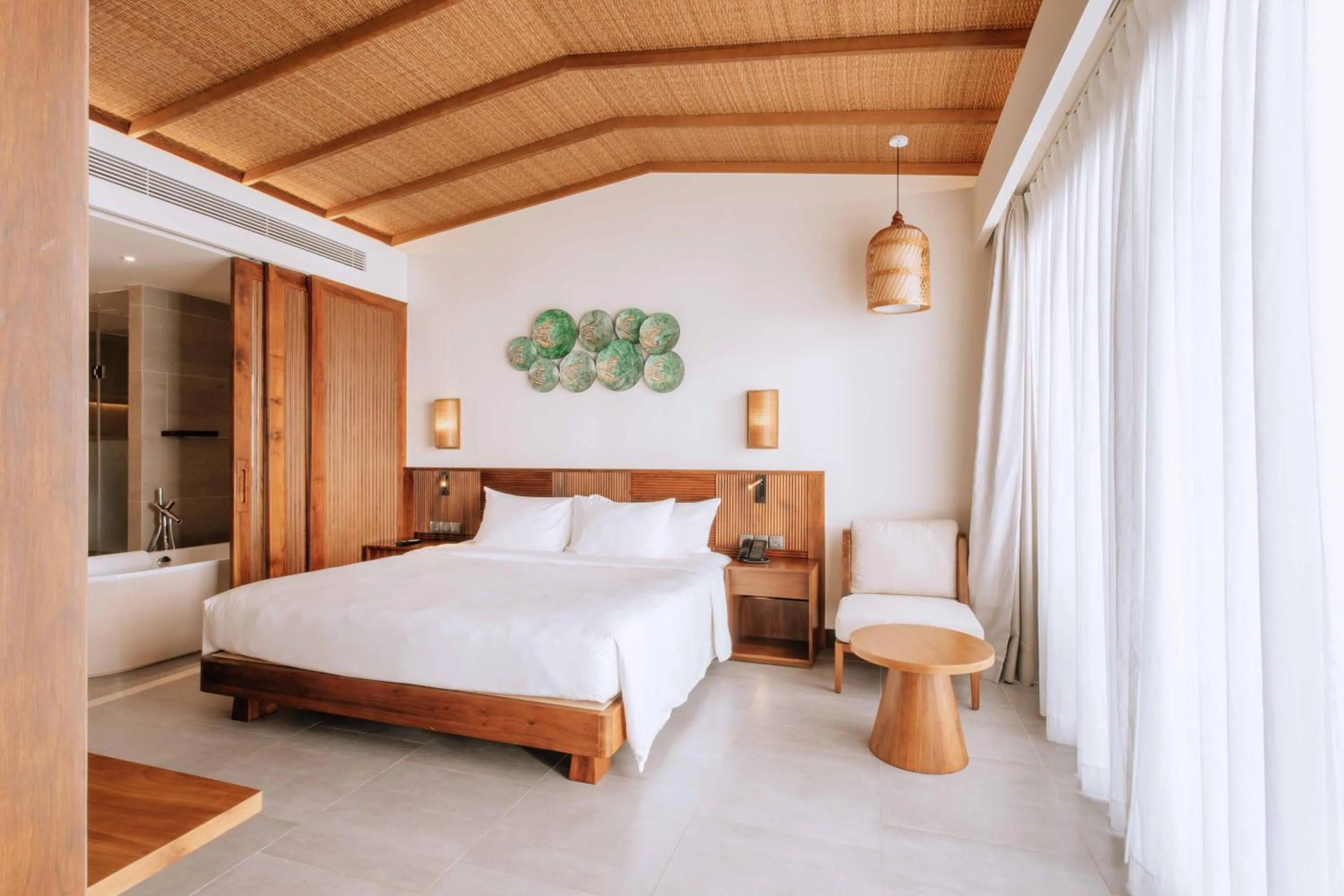 Bed in Dusit Princess Moonrise Beach Resort