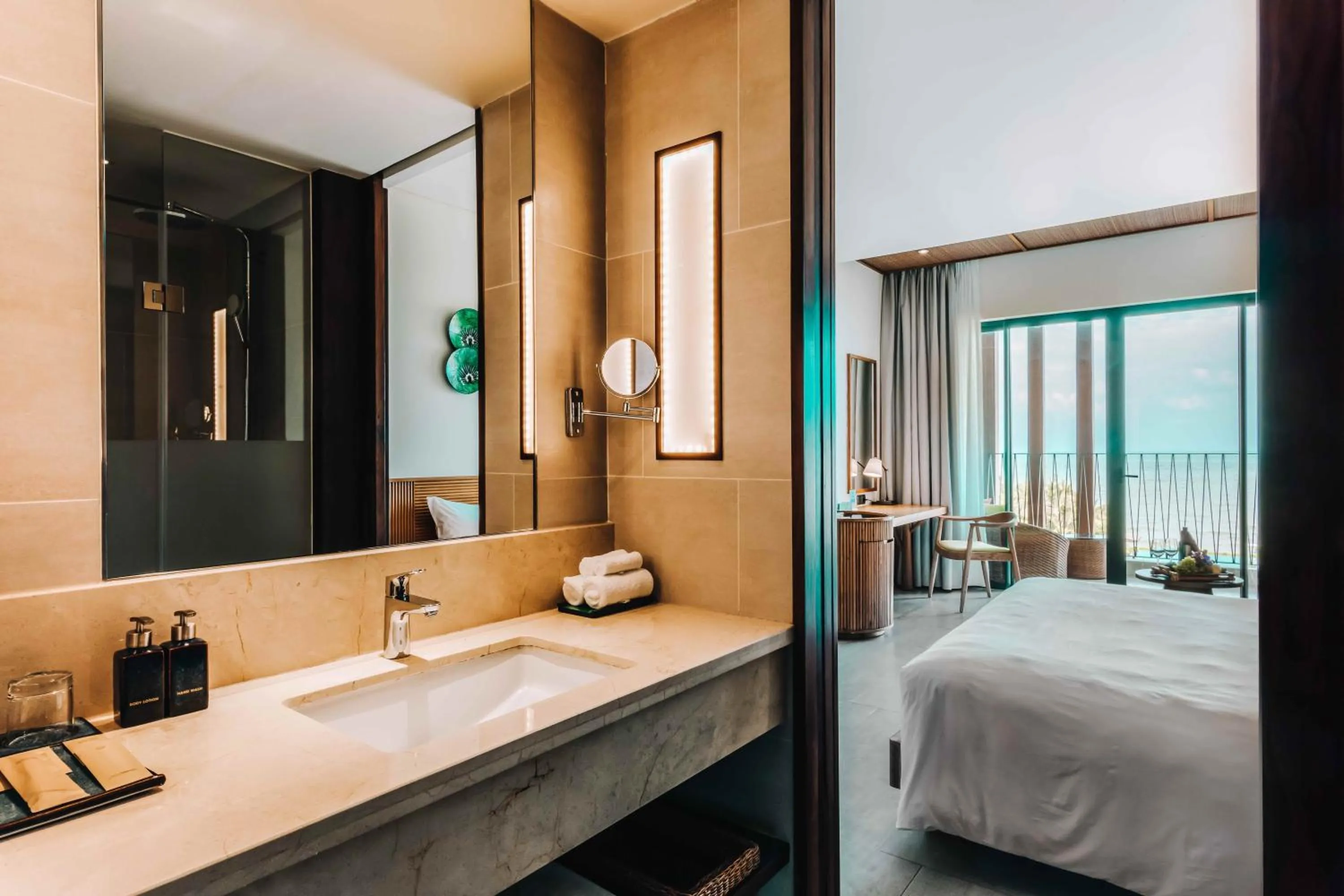 Bathroom, Bed in Dusit Princess Moonrise Beach Resort