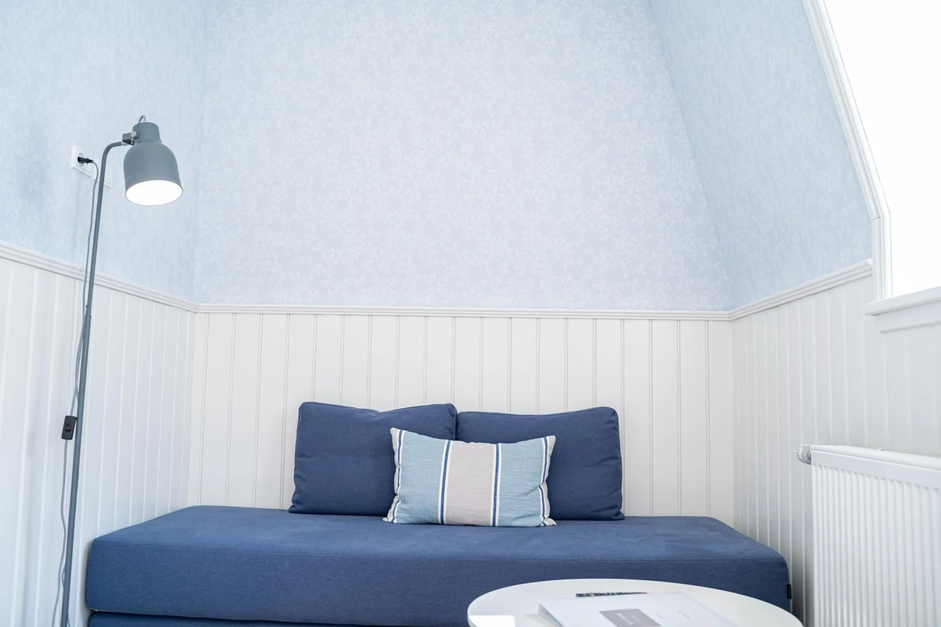 Seating area, Bed in Hotel Marie