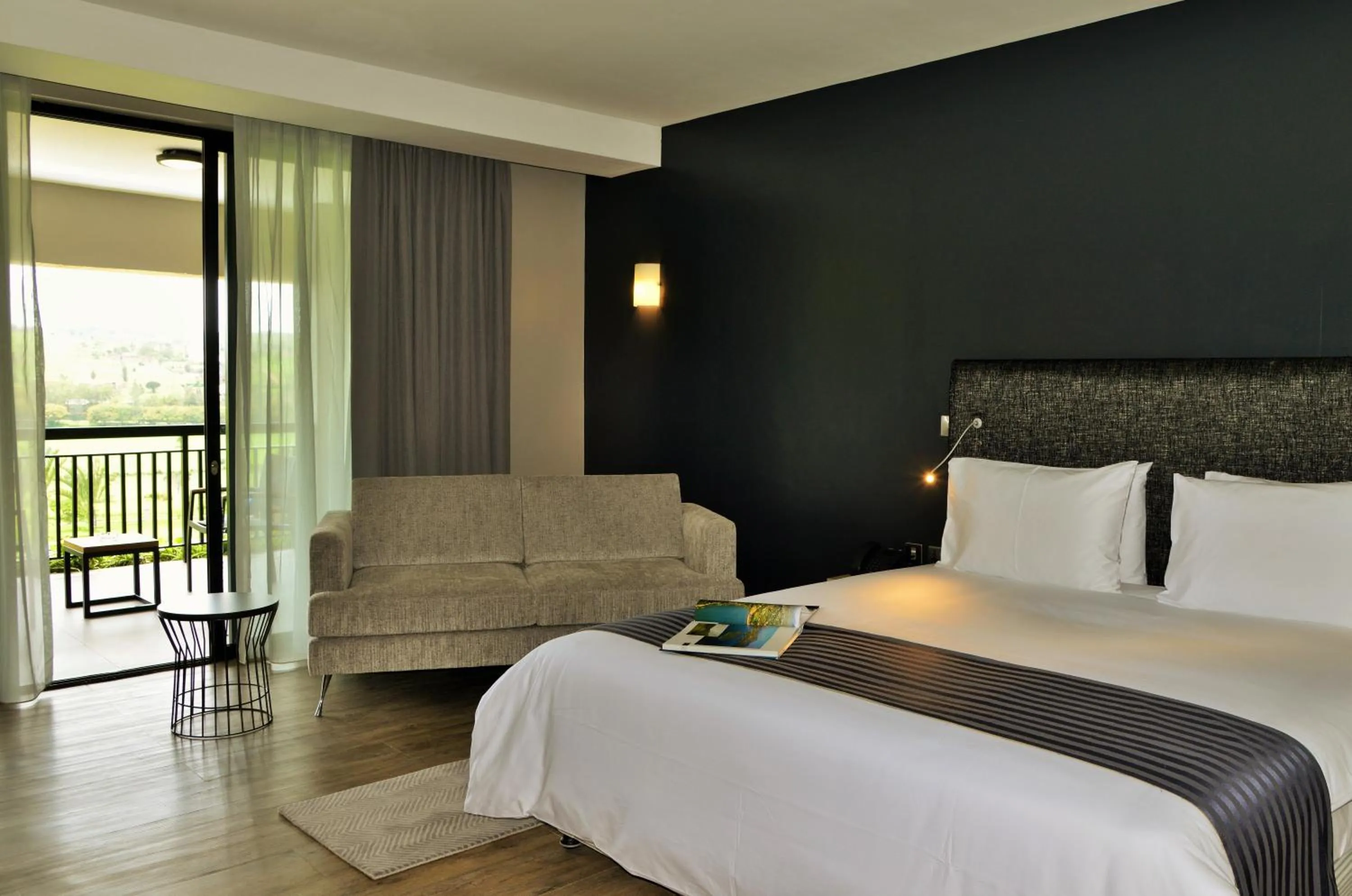 Patio, Bed in EPIC Hotel & Suites