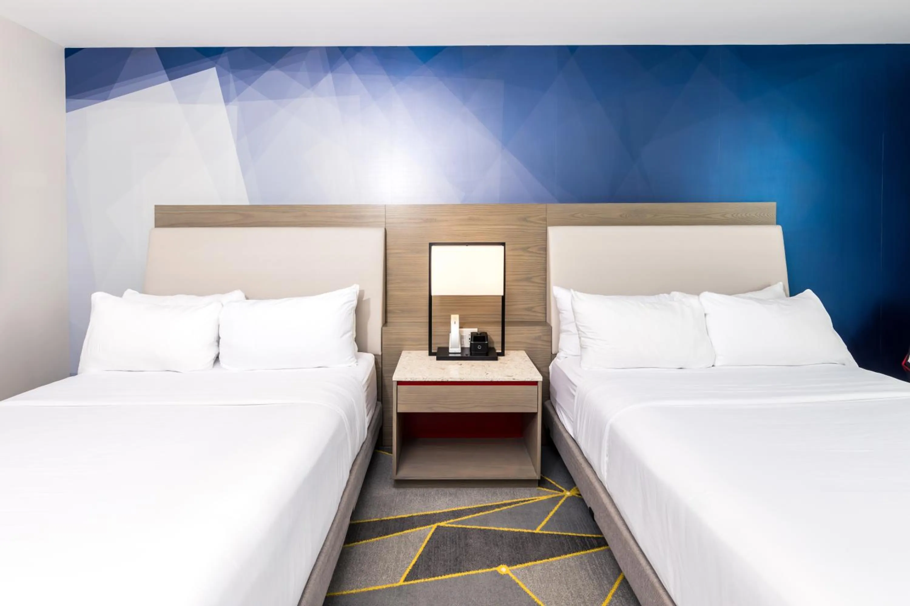 Bed in The Summit Hotel