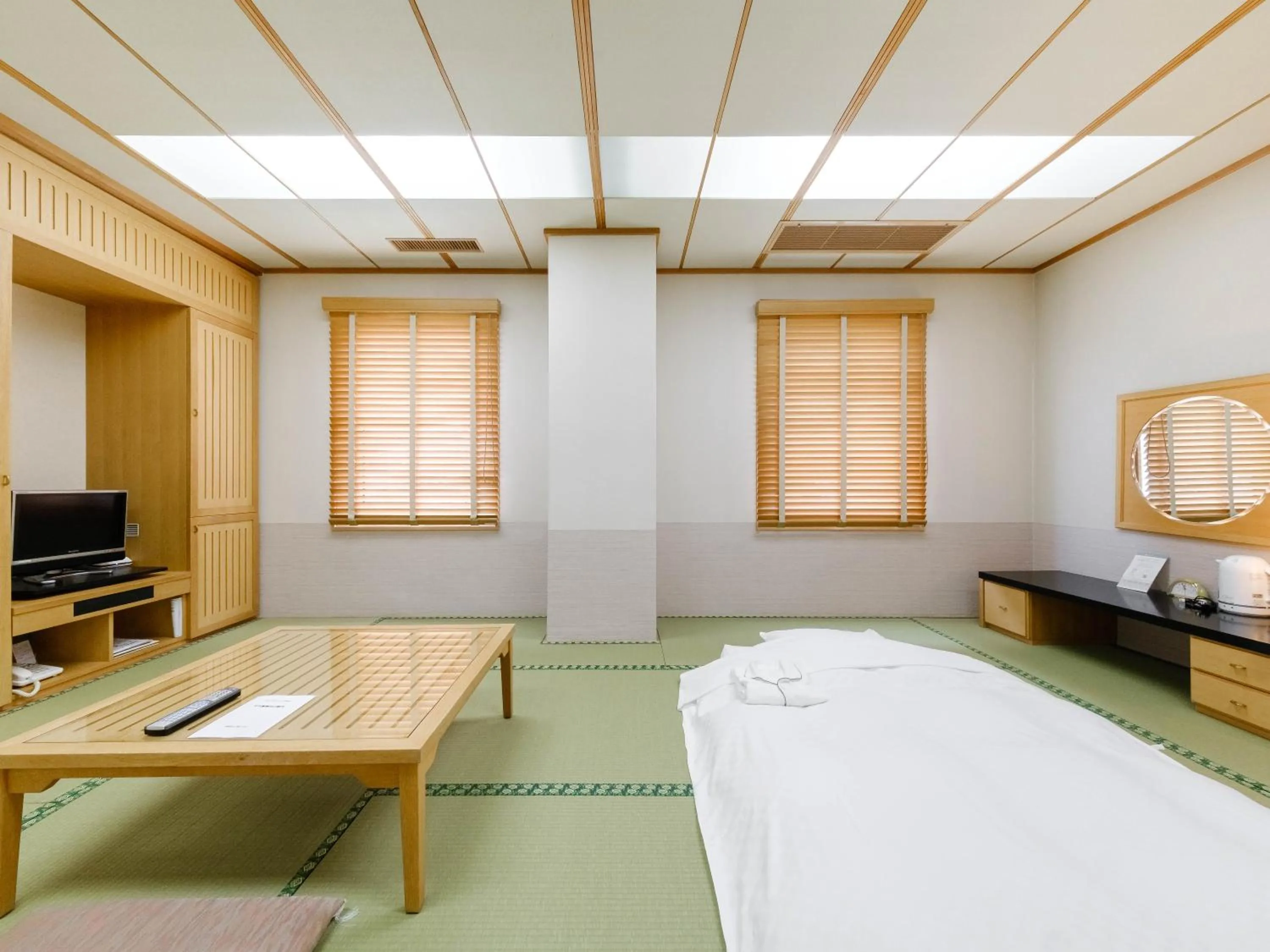 Bed in Tabist Abashiri Central Hotel