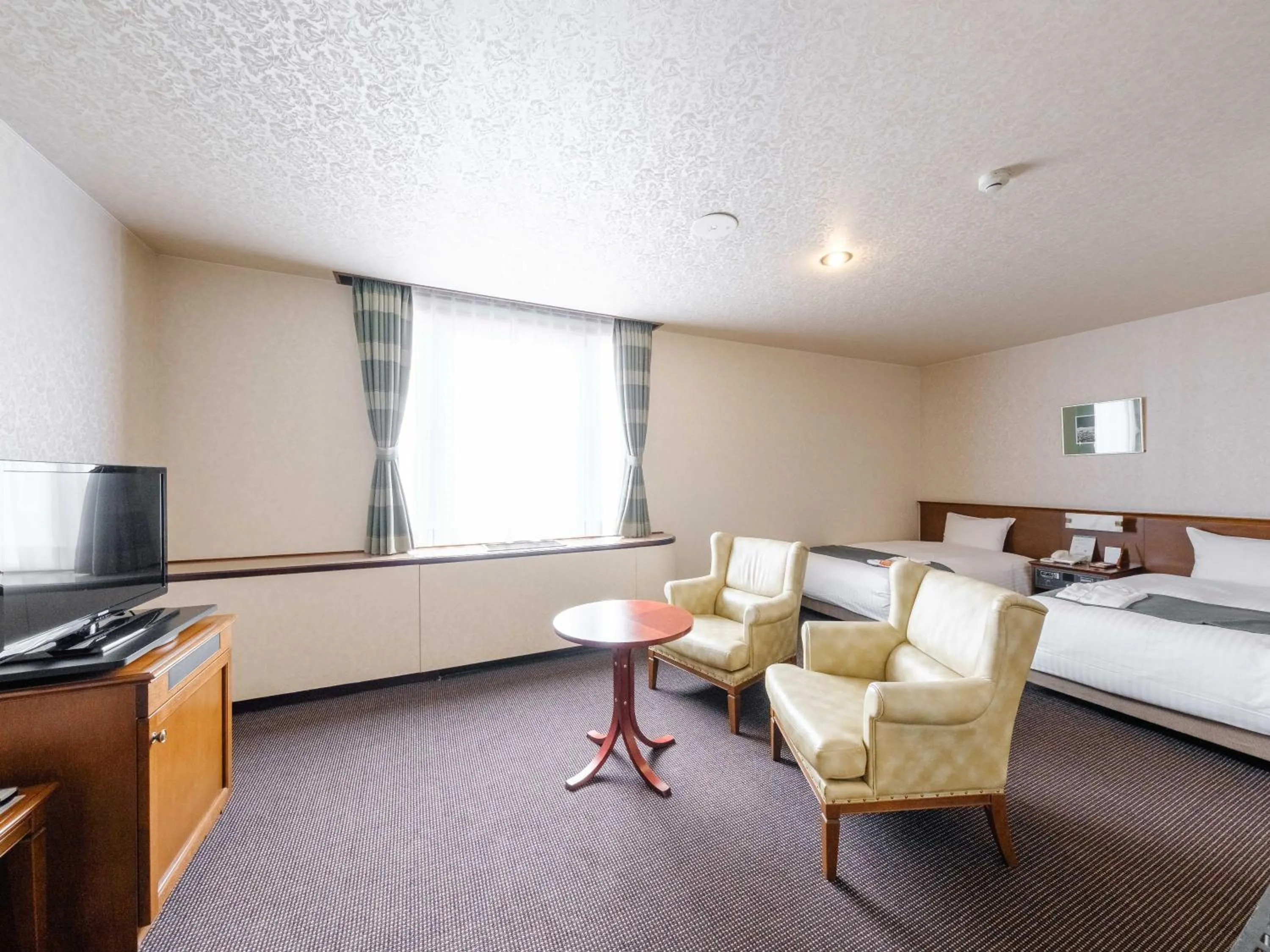 Bed in Tabist Abashiri Central Hotel