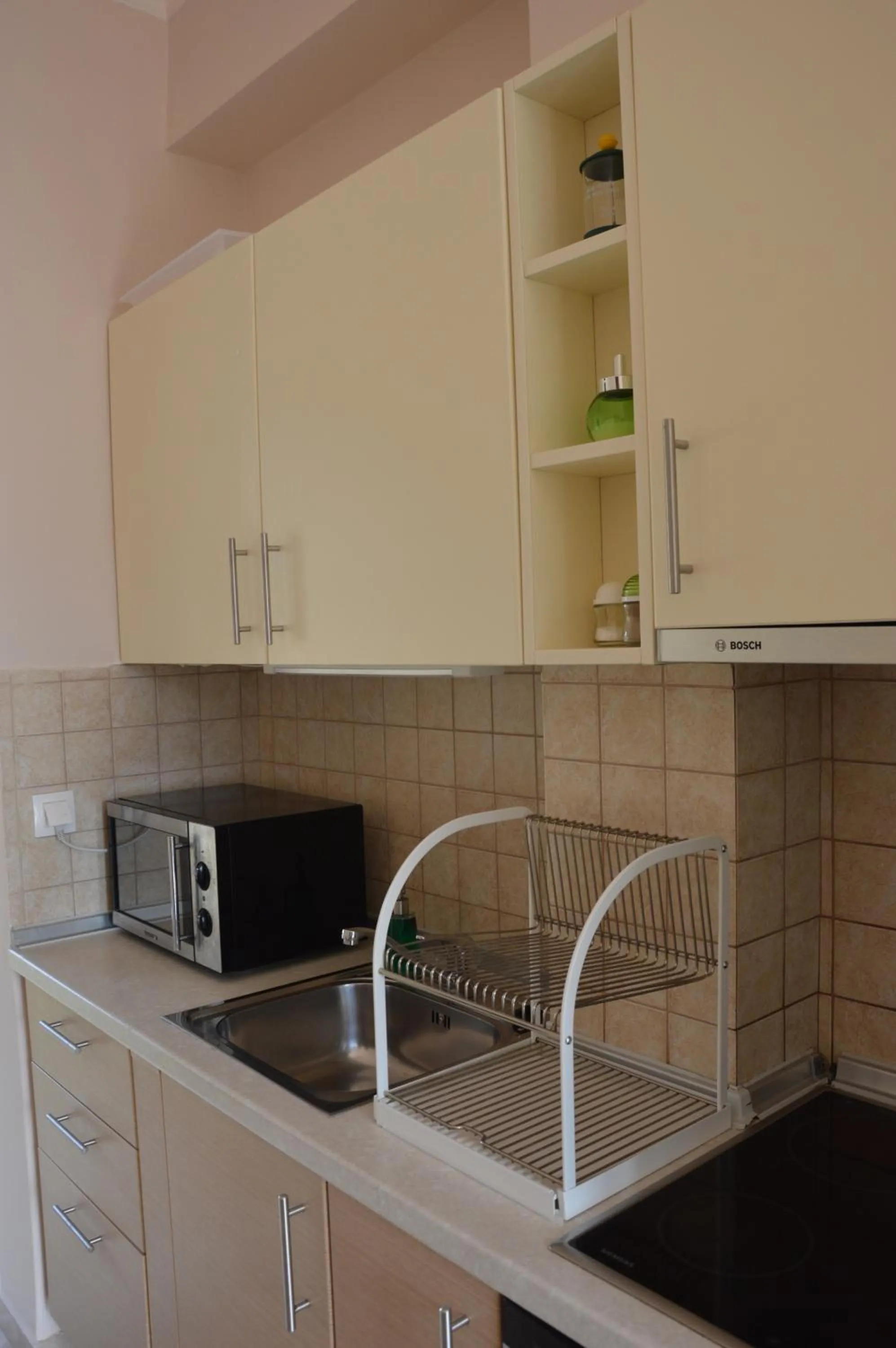 Kitchen or kitchenette in Akis Apartments