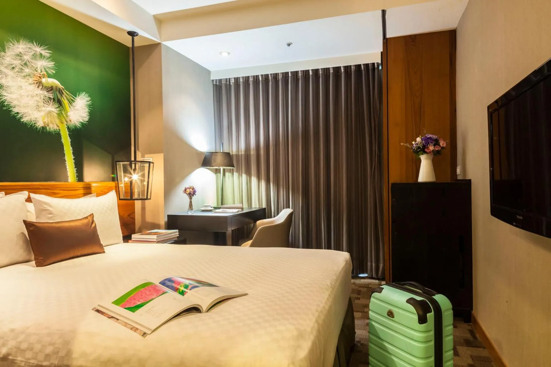 Bed in Pacific Business Hotel