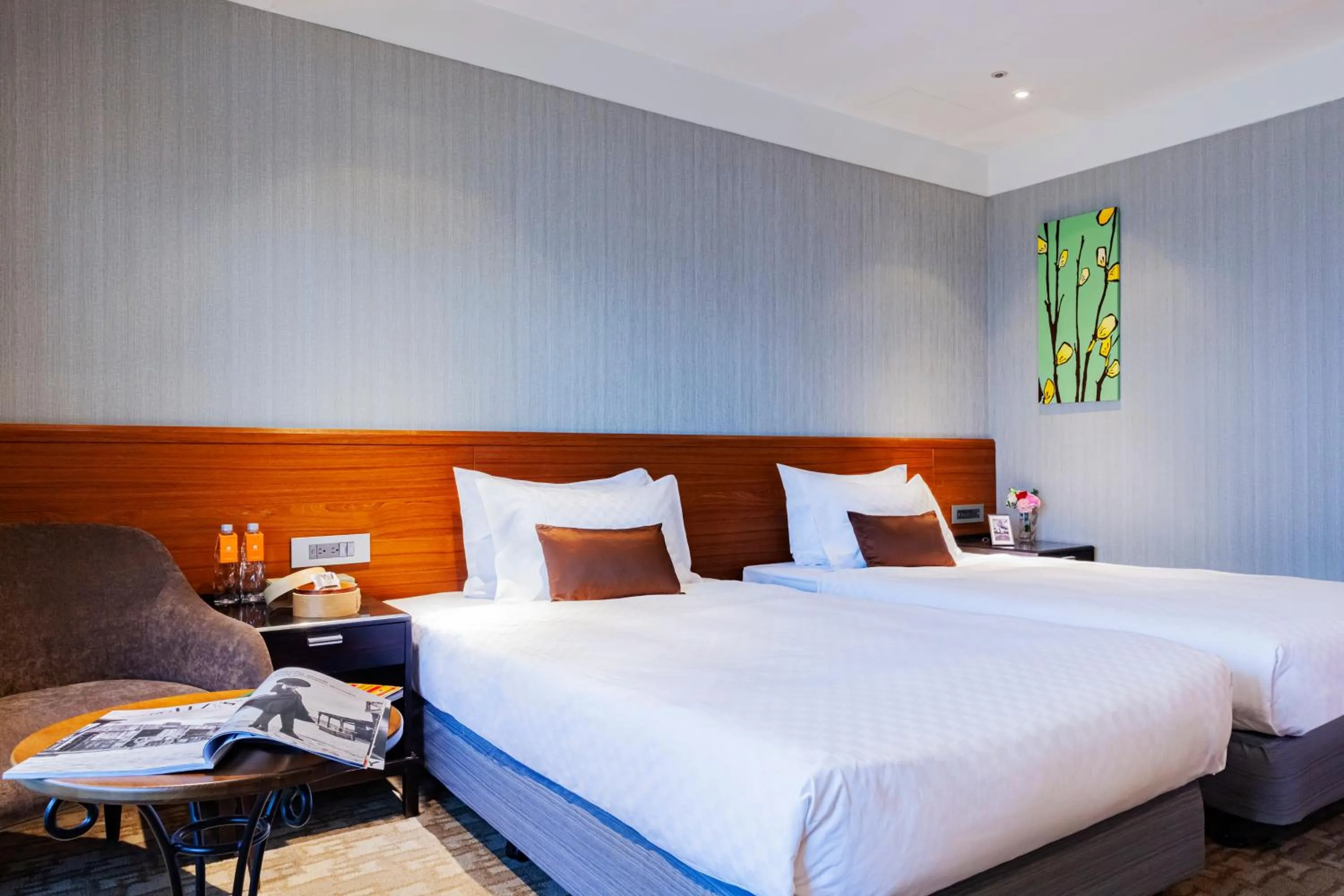 Bed in Pacific Business Hotel