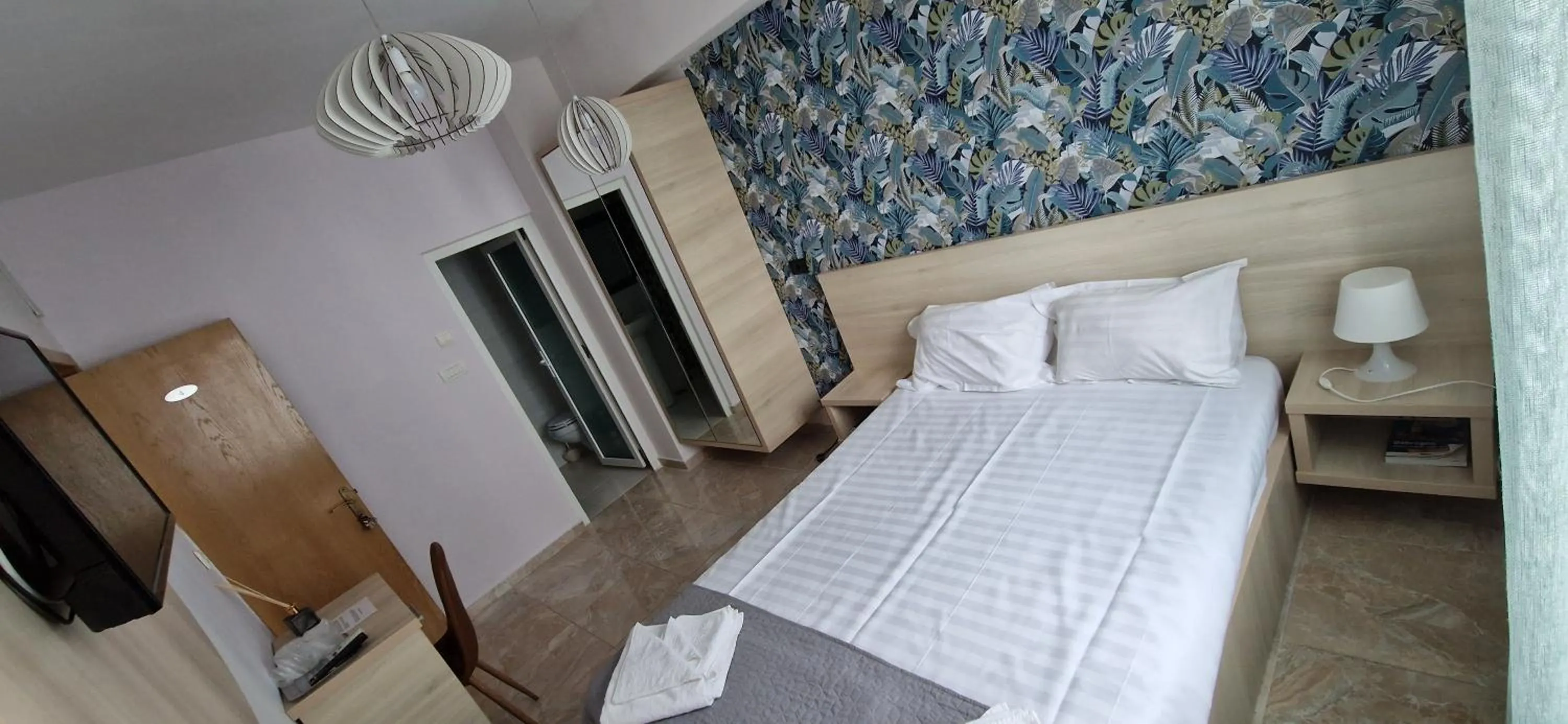Photo of the whole room, Bed in OITUZ Boutique Residence