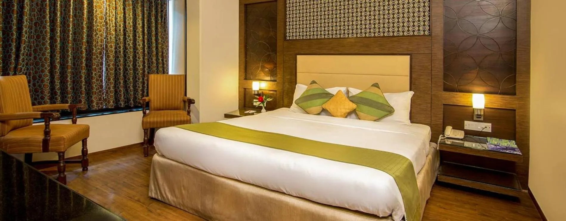 Bed in Vikram Vintage Inn