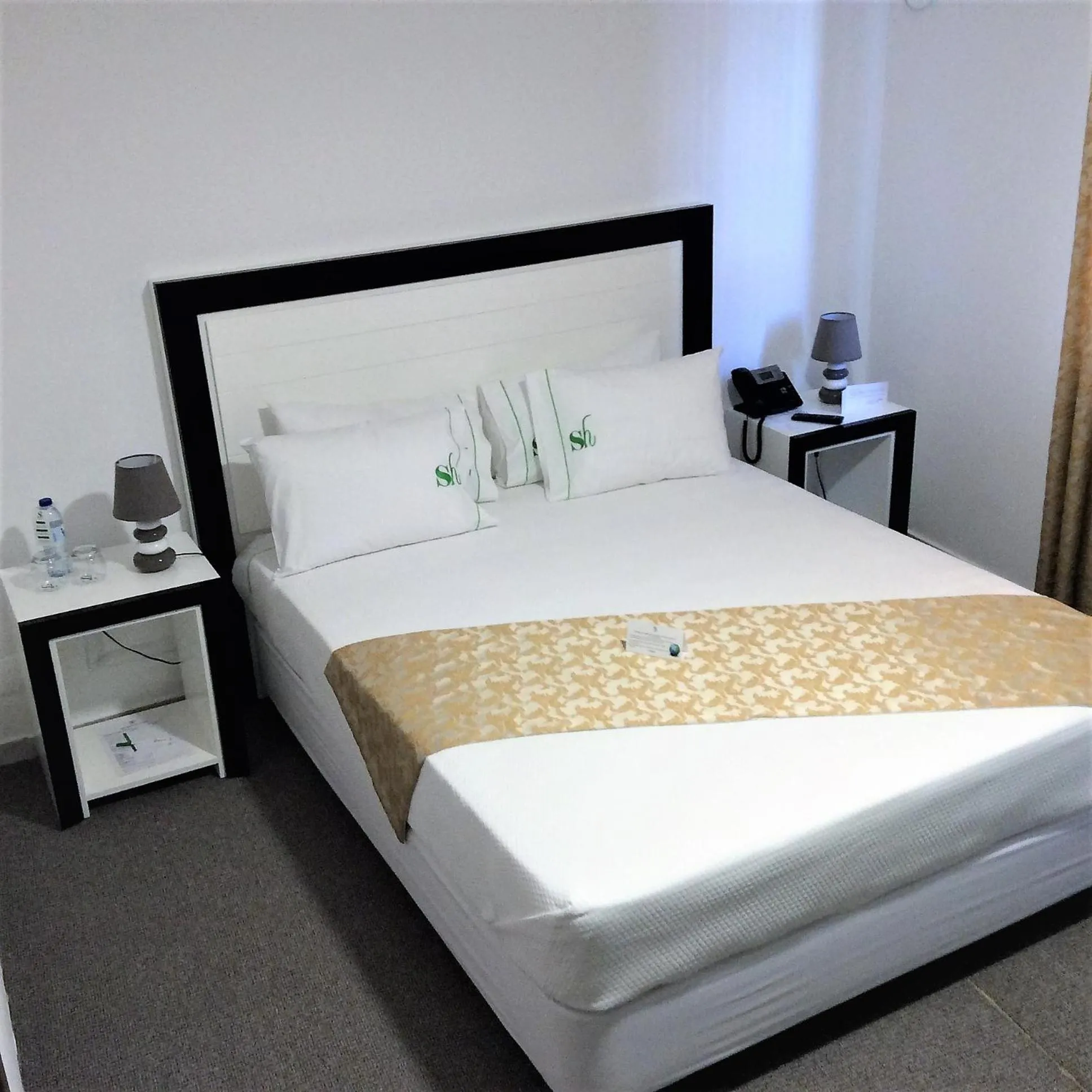 Bed in SH Boutique Hotel