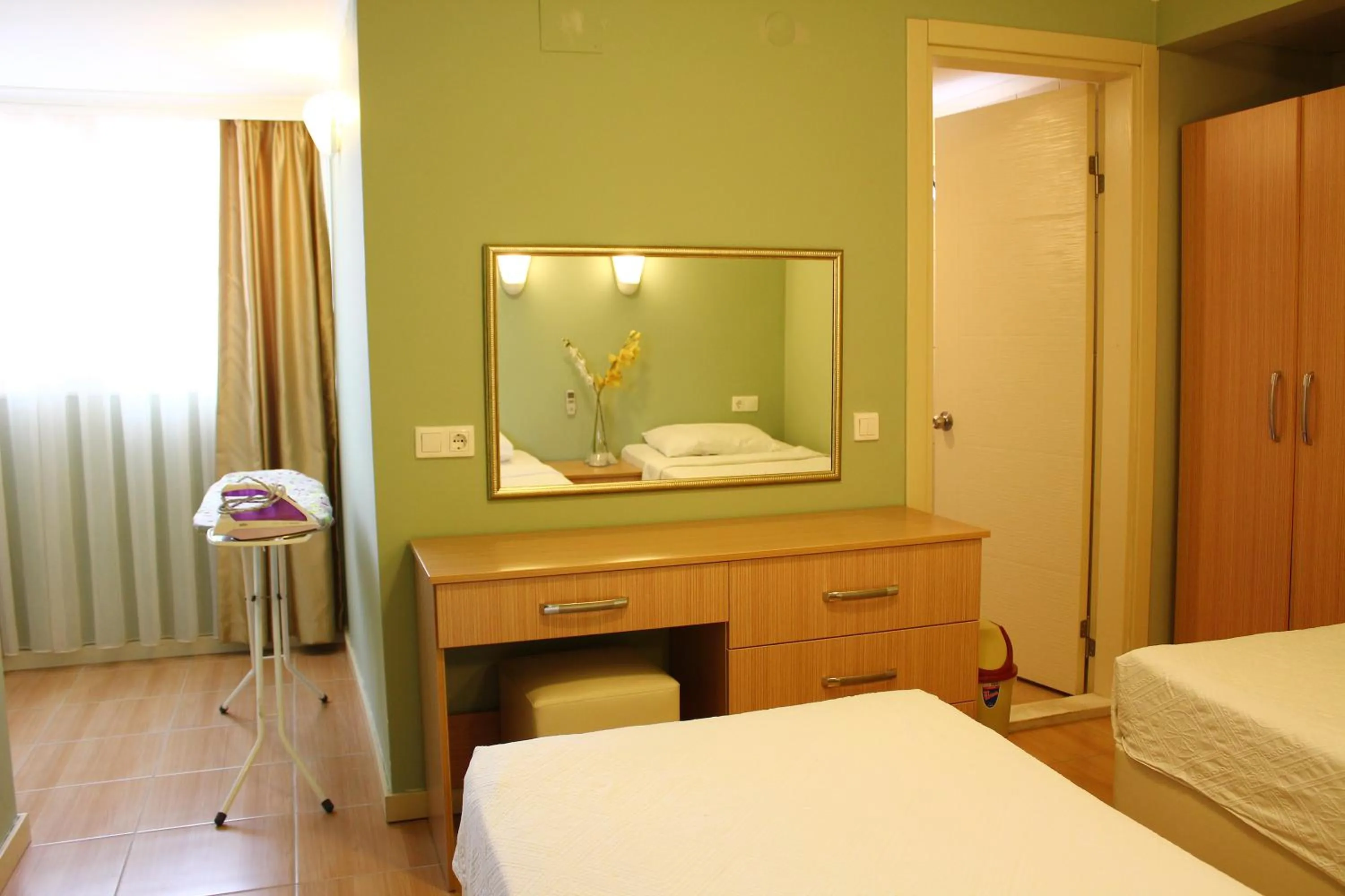 Seating area, Bed in Hotel Dost