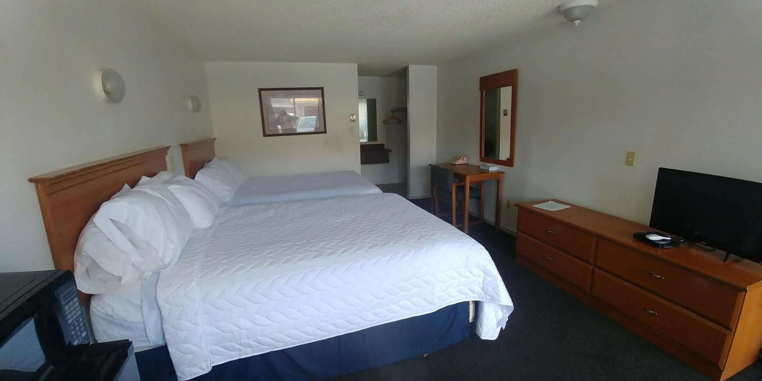 Bed in Thunderbird Motel