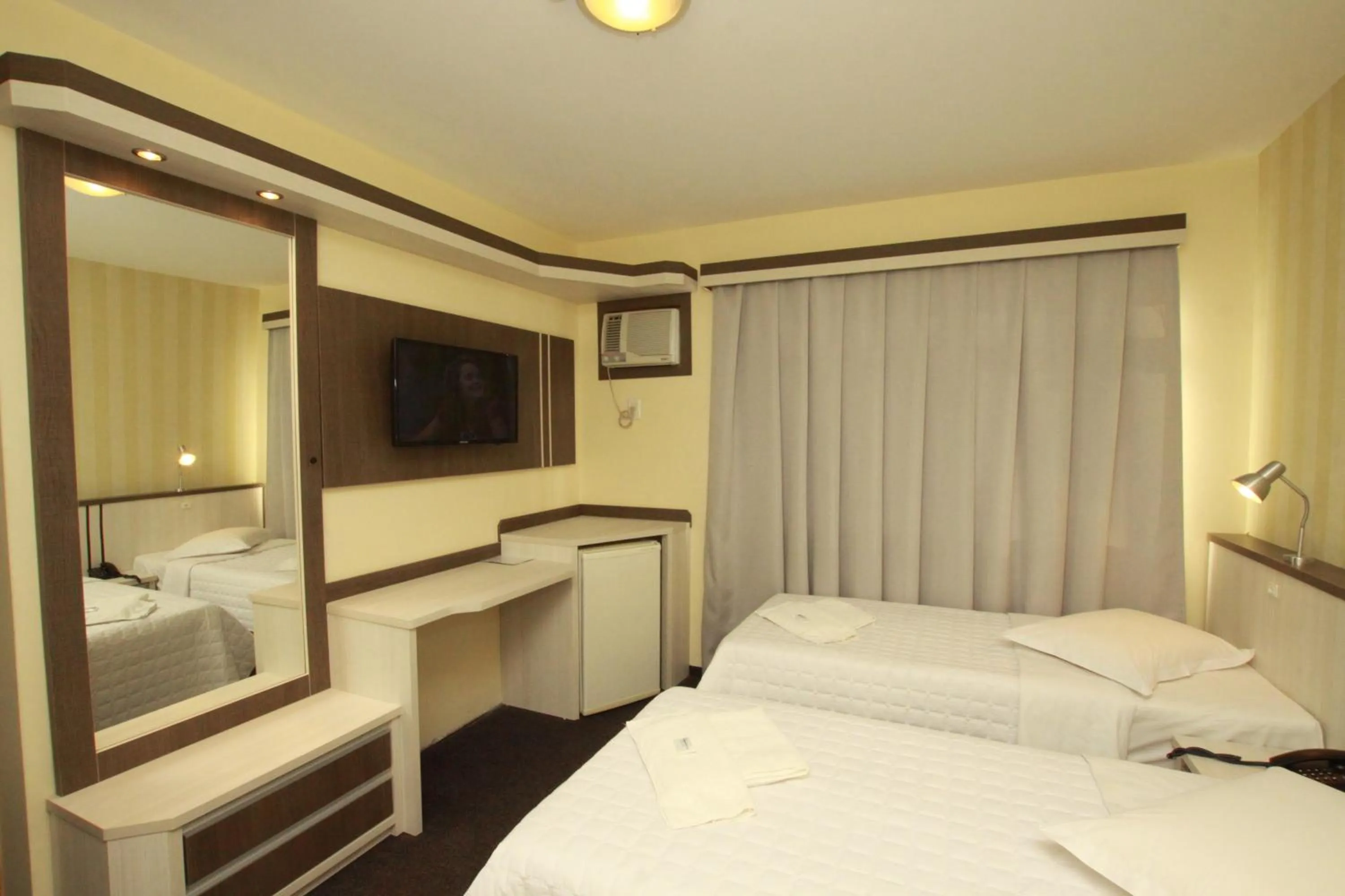 Photo of the whole room, Bed in Hotel Blumenau - Balneário Camboriú